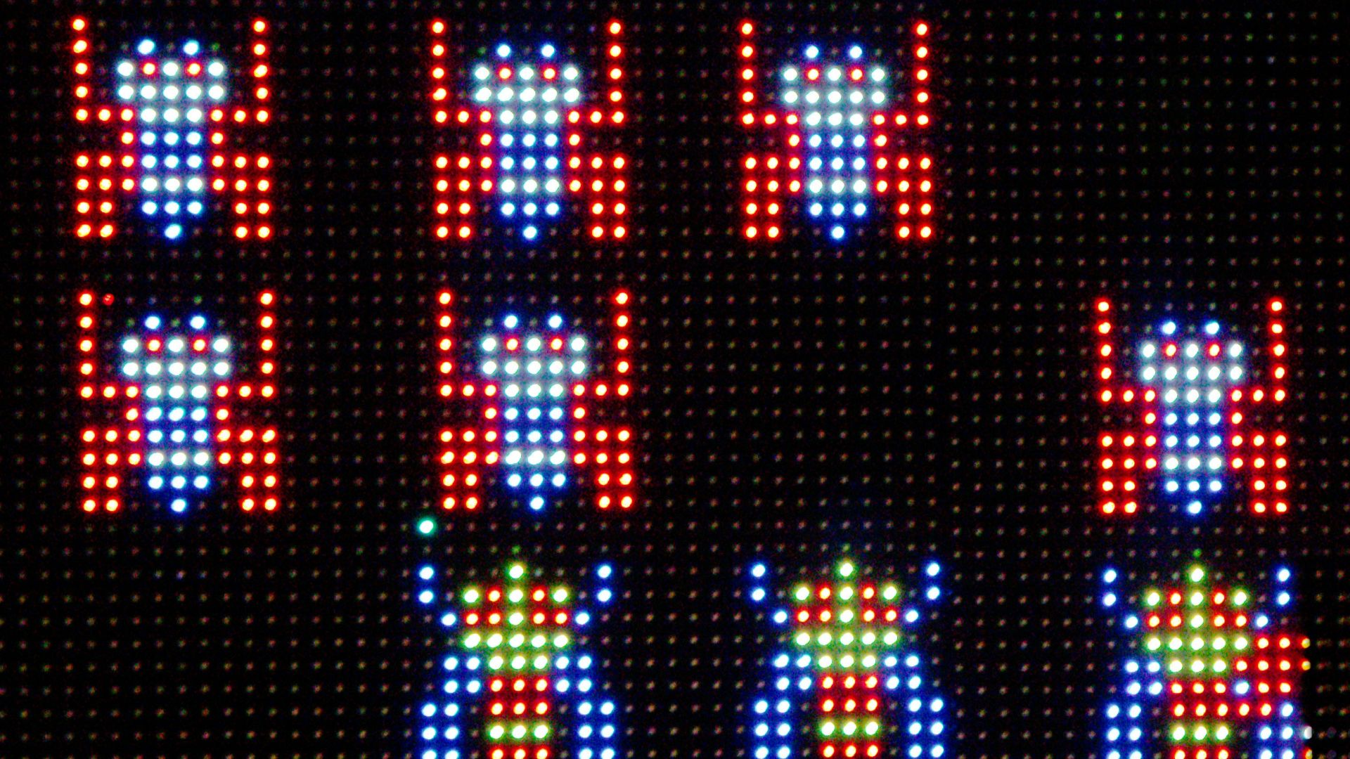 a close up of a lit up sign on a building