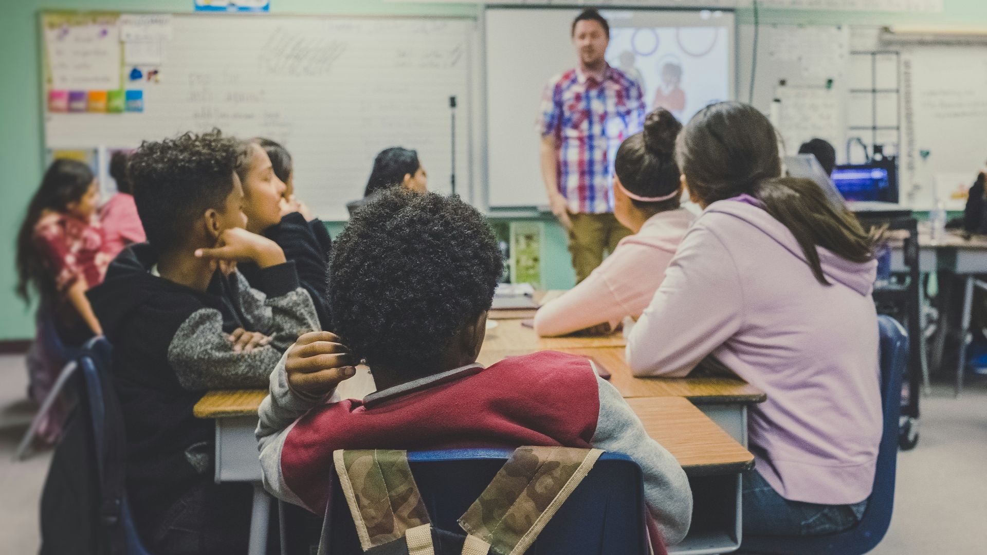 man and woman sitting on chairs