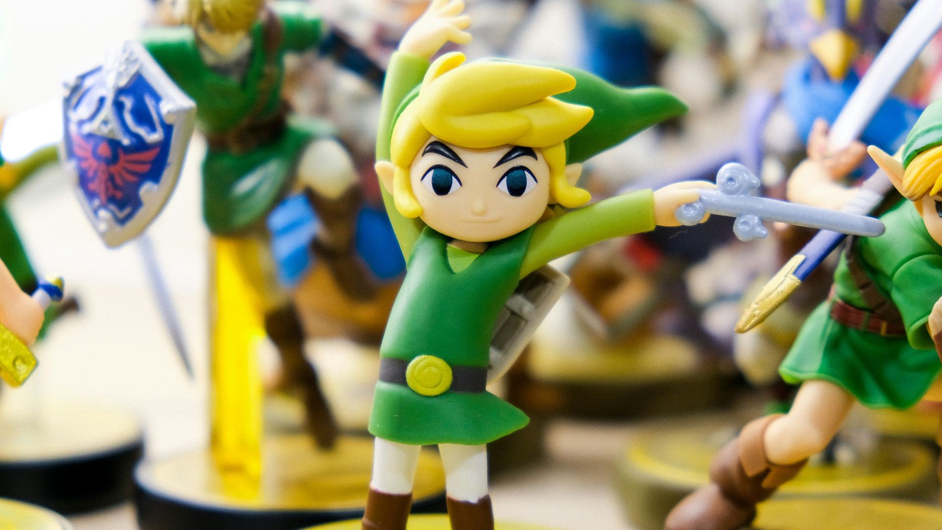 selective focus photography of Link vinyl figures