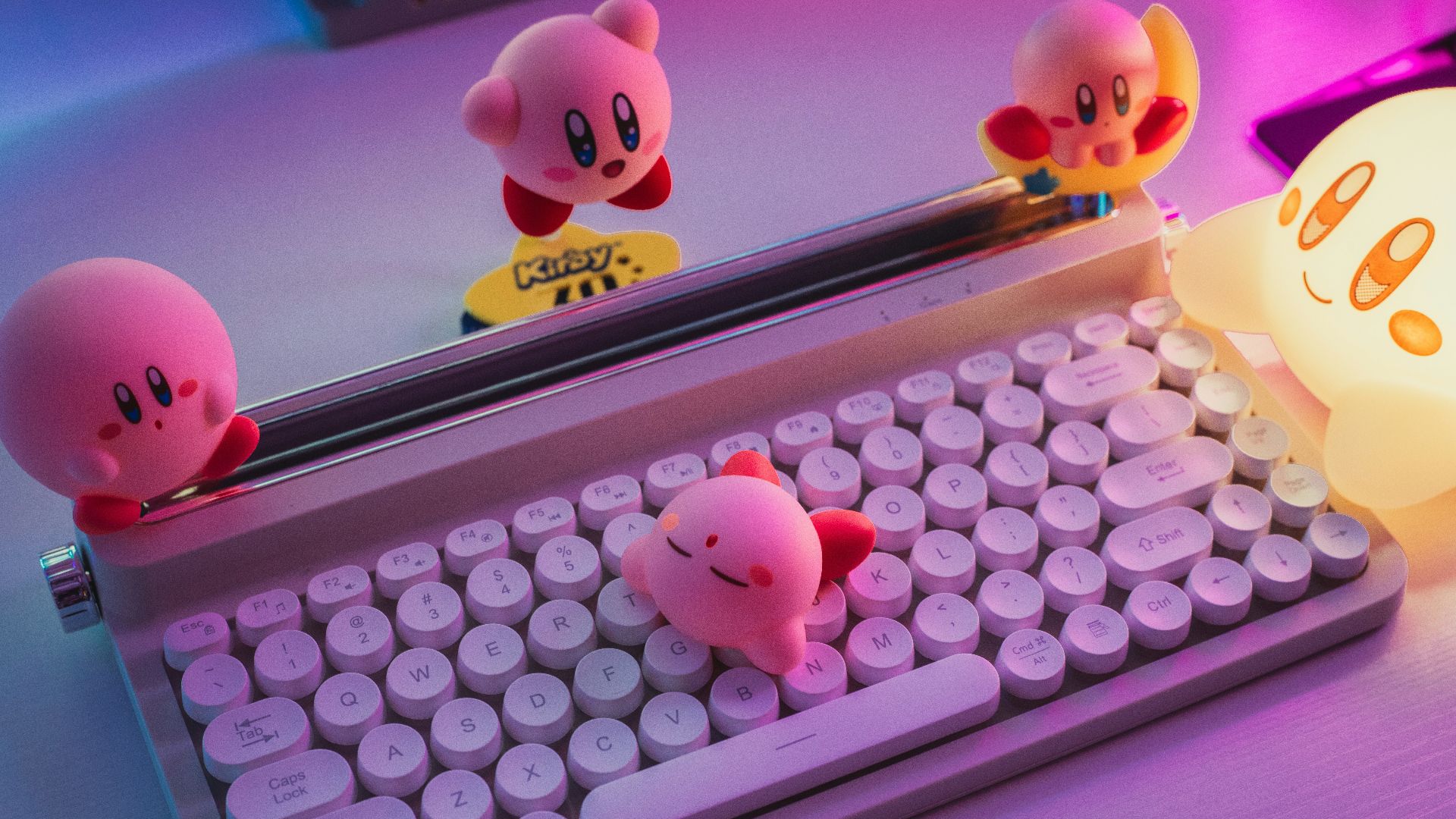 a computer keyboard sitting on top of a desk