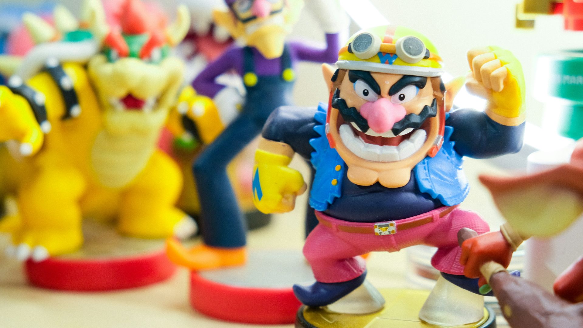 Super Mario vinyl figures on table