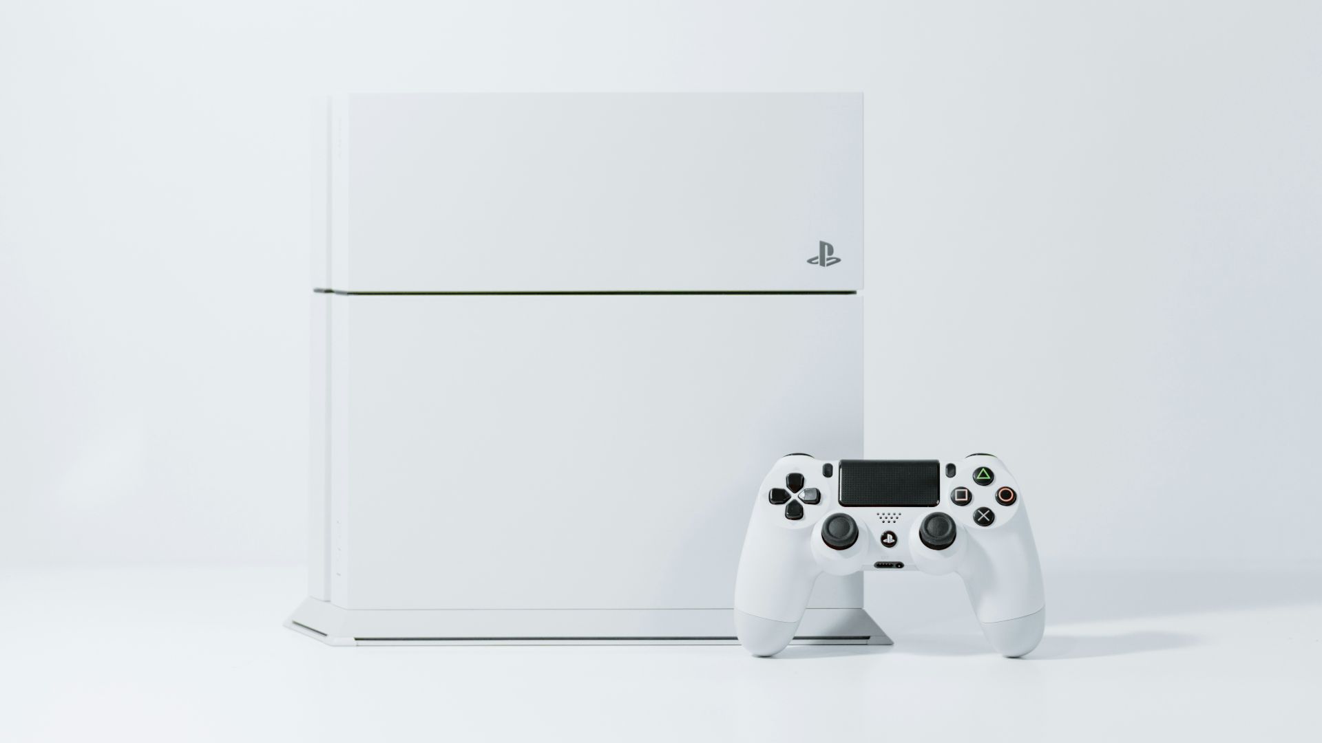 white Sony PS4 Original with controller