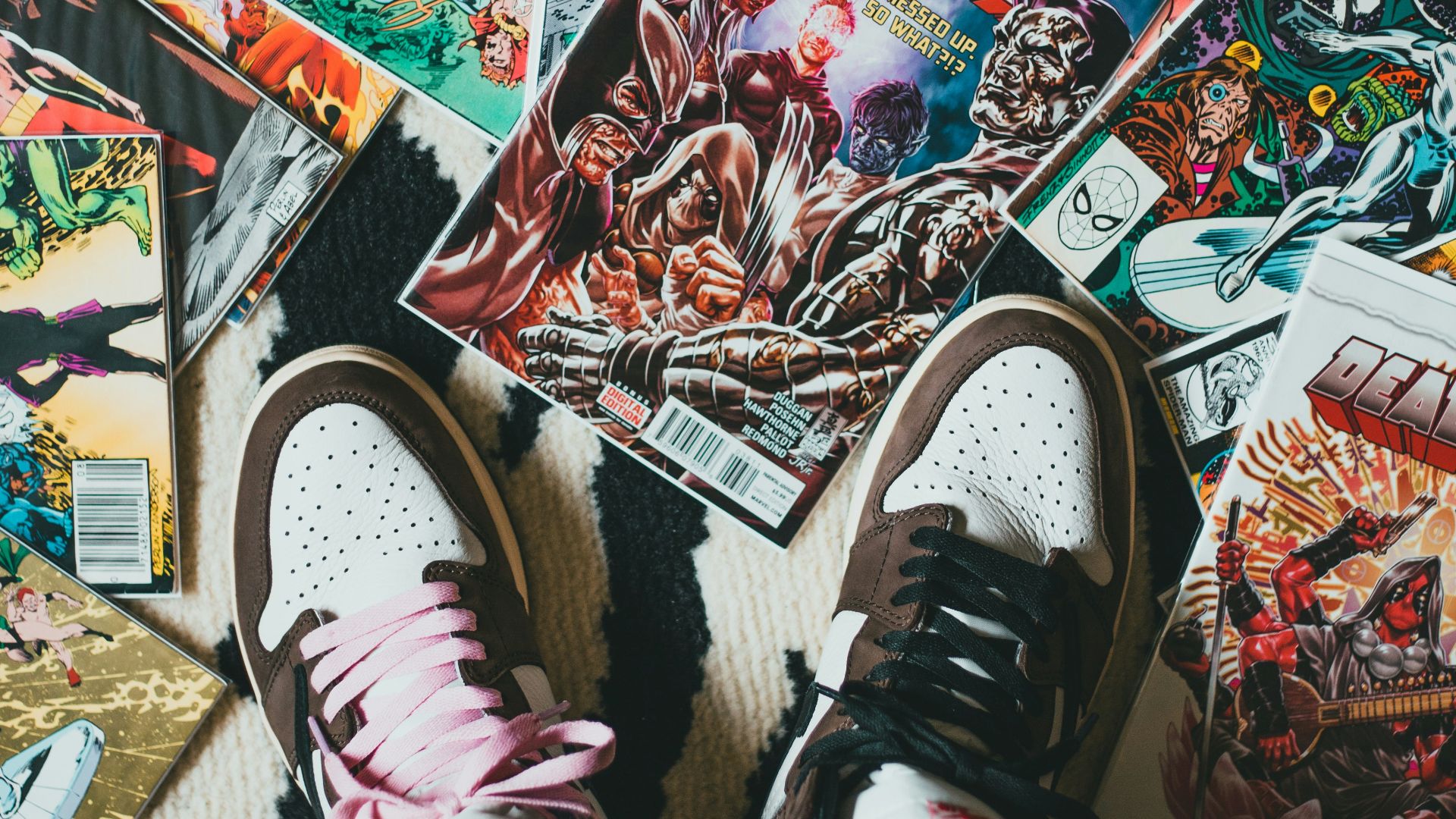 person wearing black and white sneakers