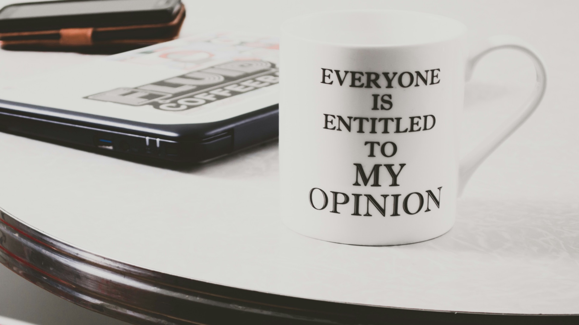 white ceramic mug on table