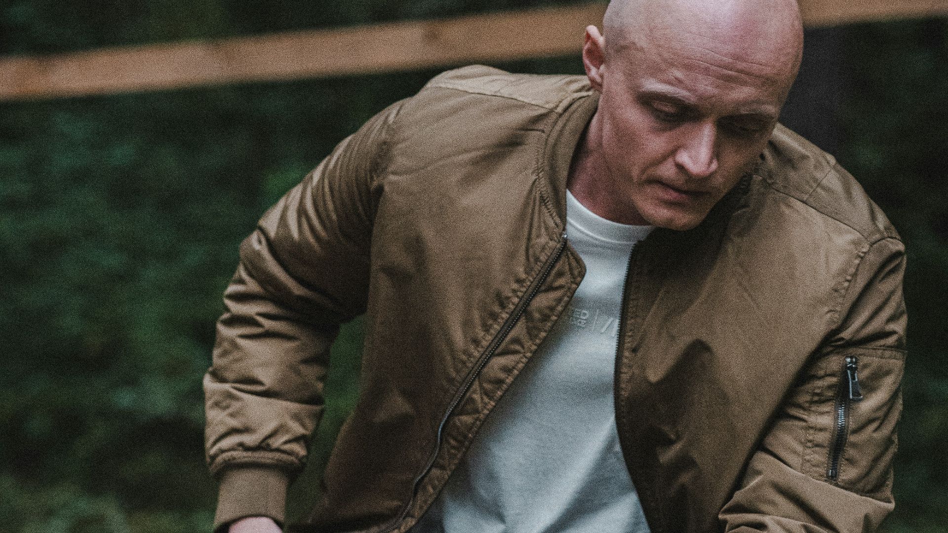 a man sitting on a bench