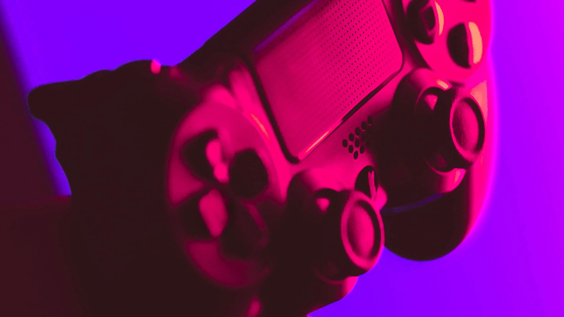 person holding black and gray game controller