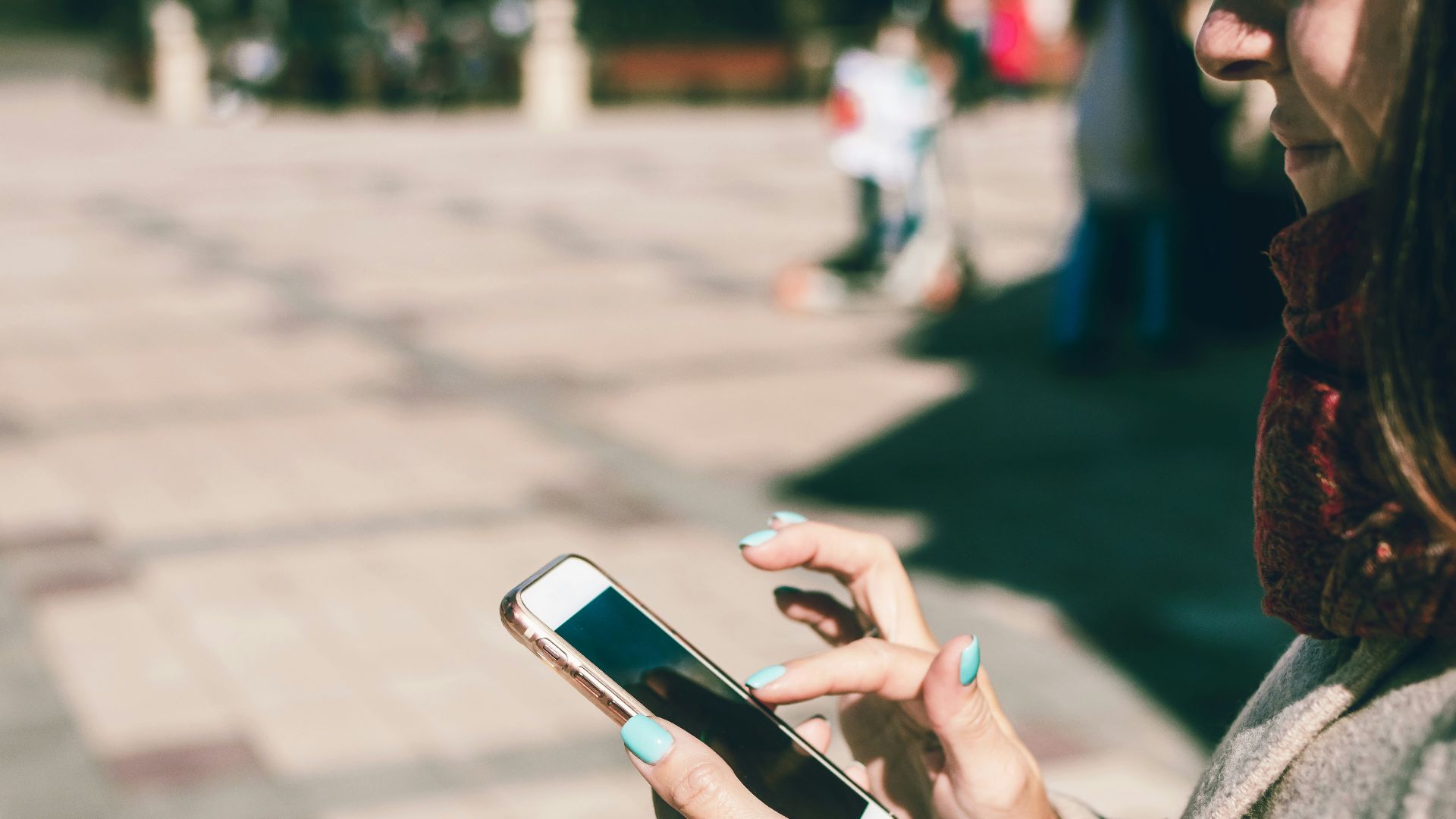 woman using smartphone