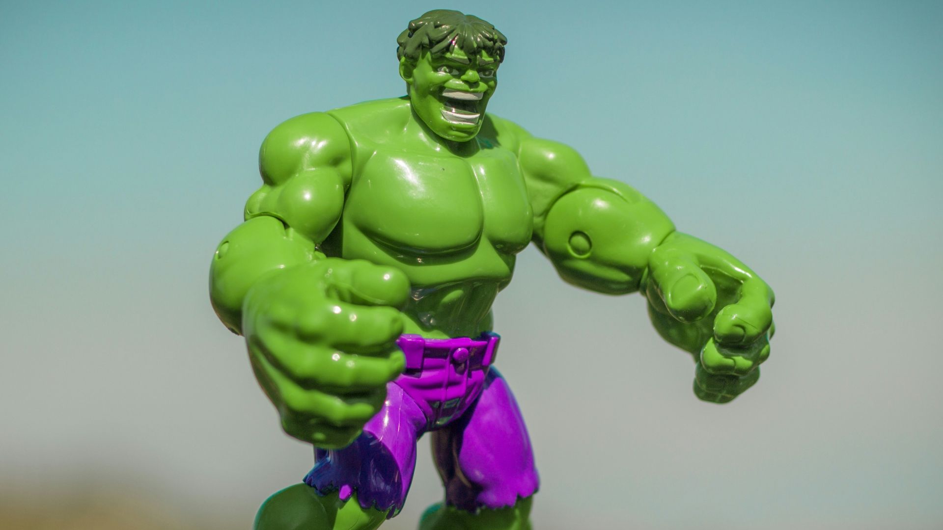 Marvel Hulk action figure standing on gray surface