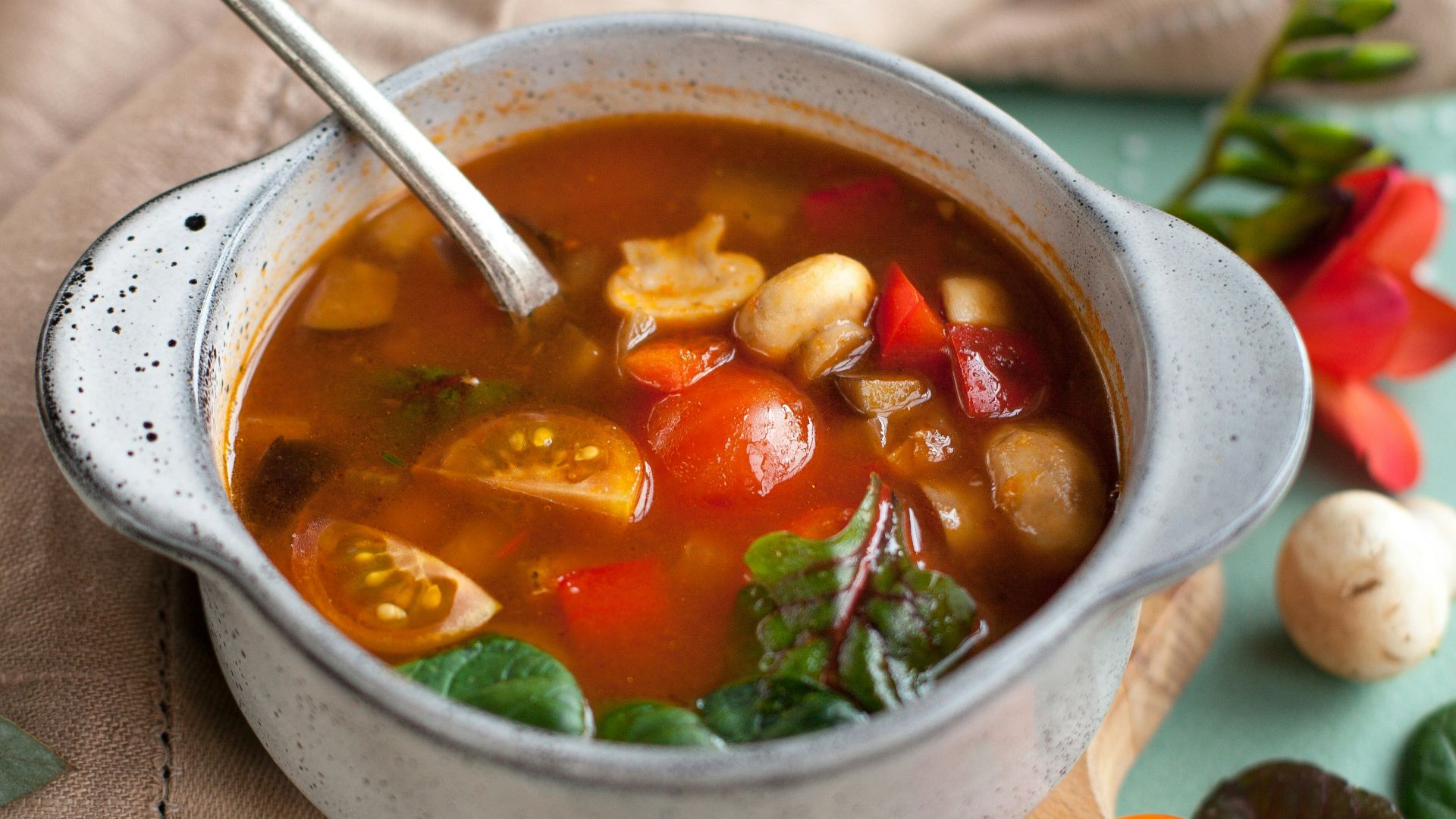 stainless steel spoon on white ceramic bowl