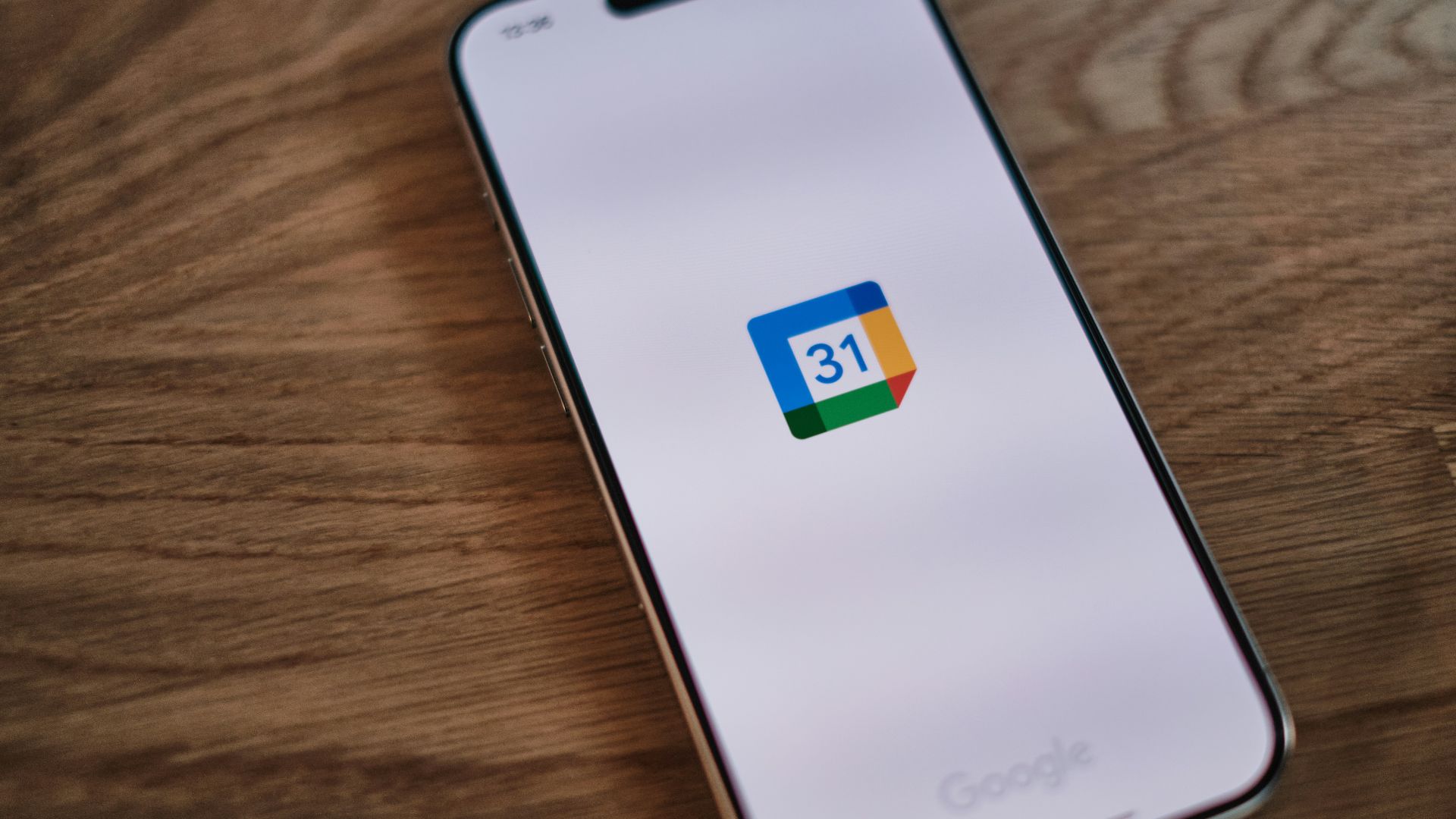 A phone with the google 13 logo on it