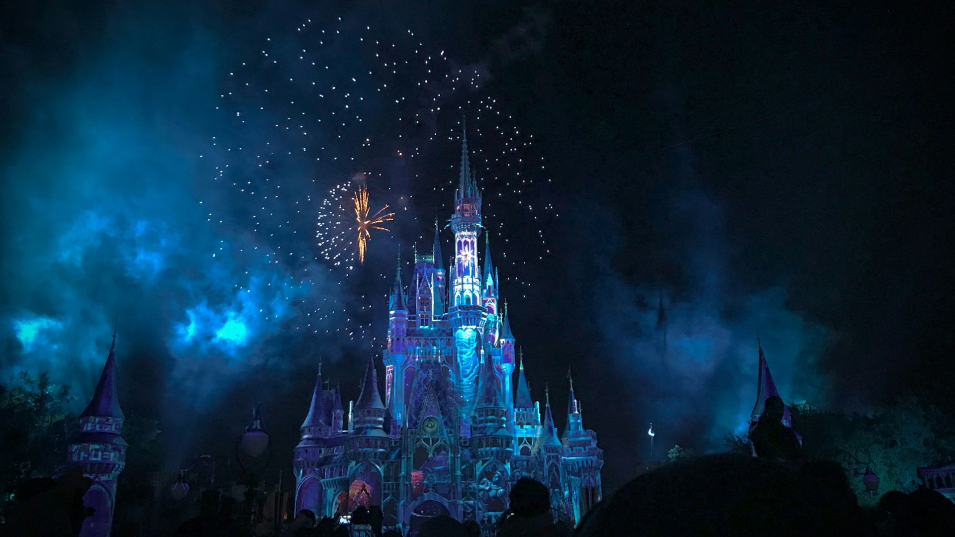crystal castle with fireworks at night