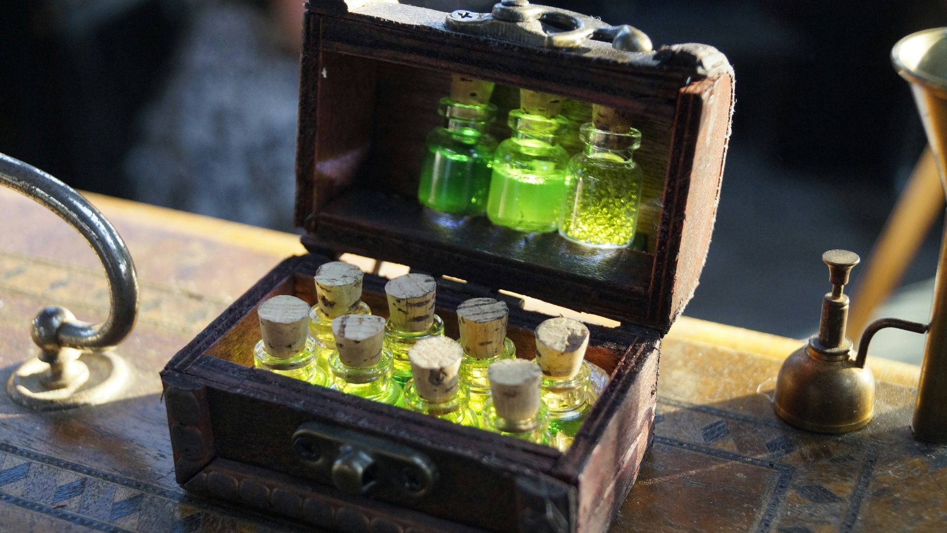 clear glass bottles in brown wooden box