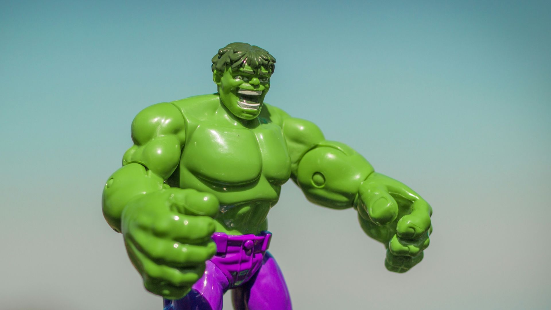 Marvel Hulk action figure standing on gray surface