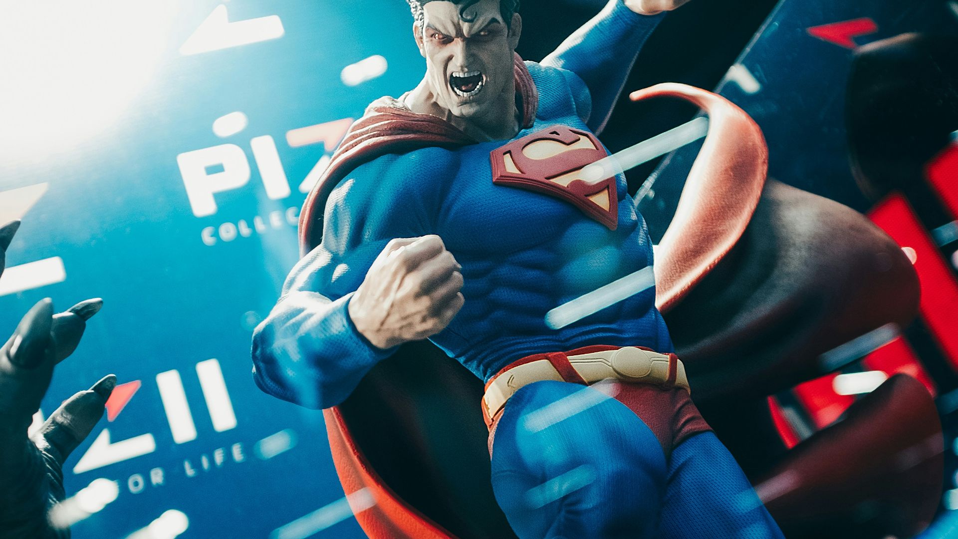 a statue of a man in a superman suit