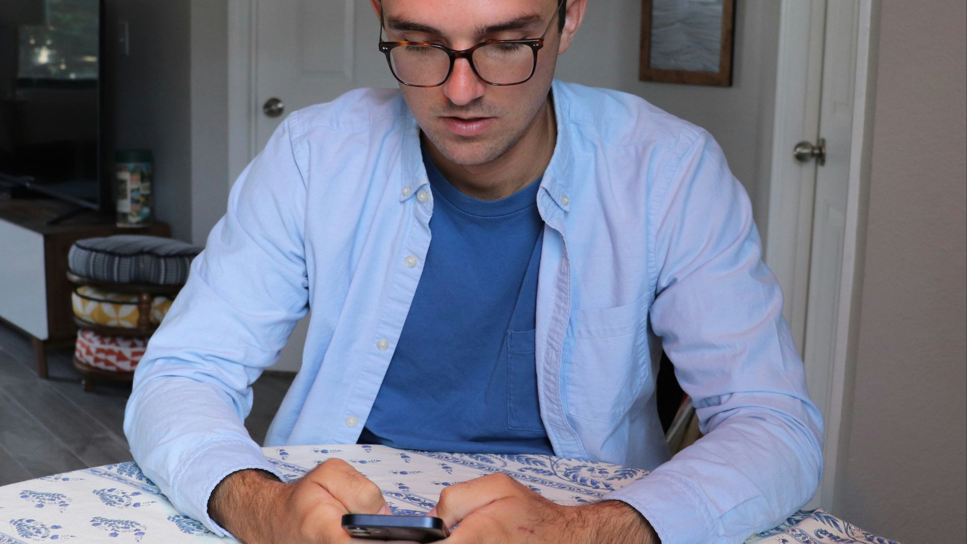 man in white dress shirt and blue necktie