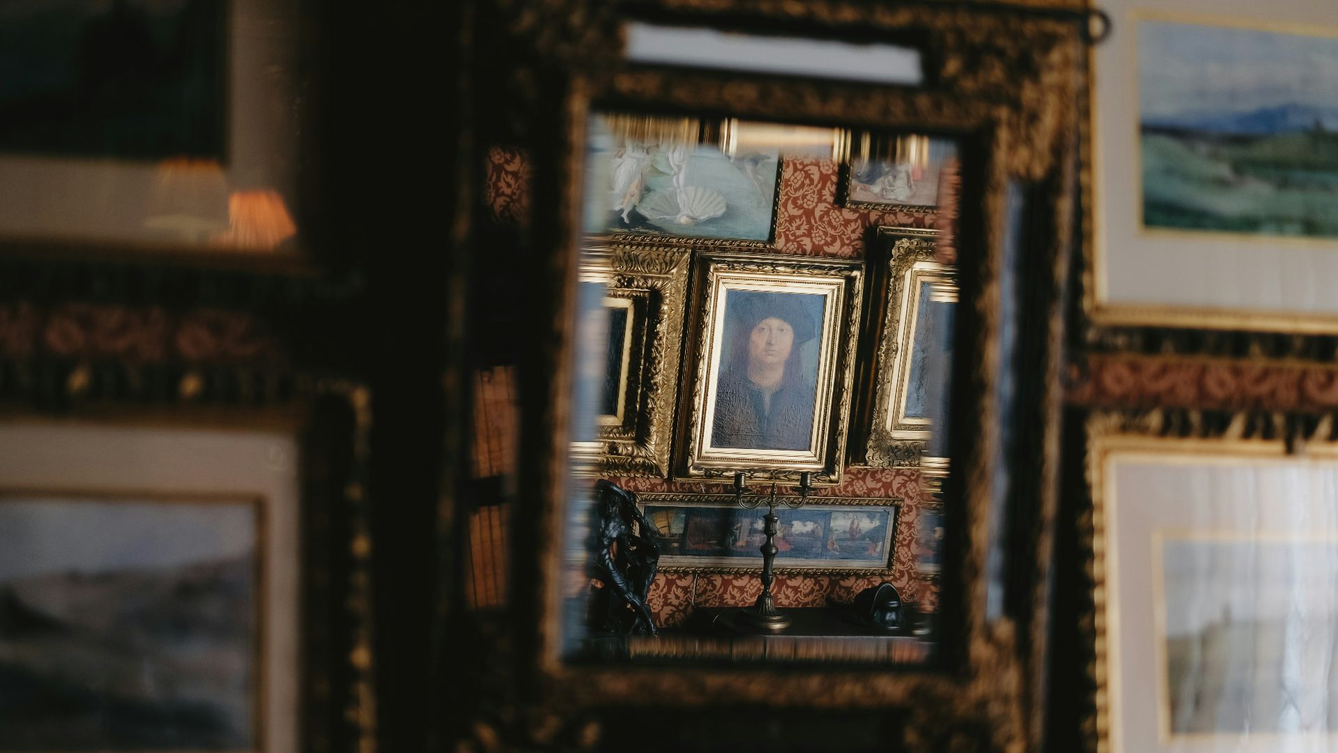 a picture of a woman is reflected in a mirror