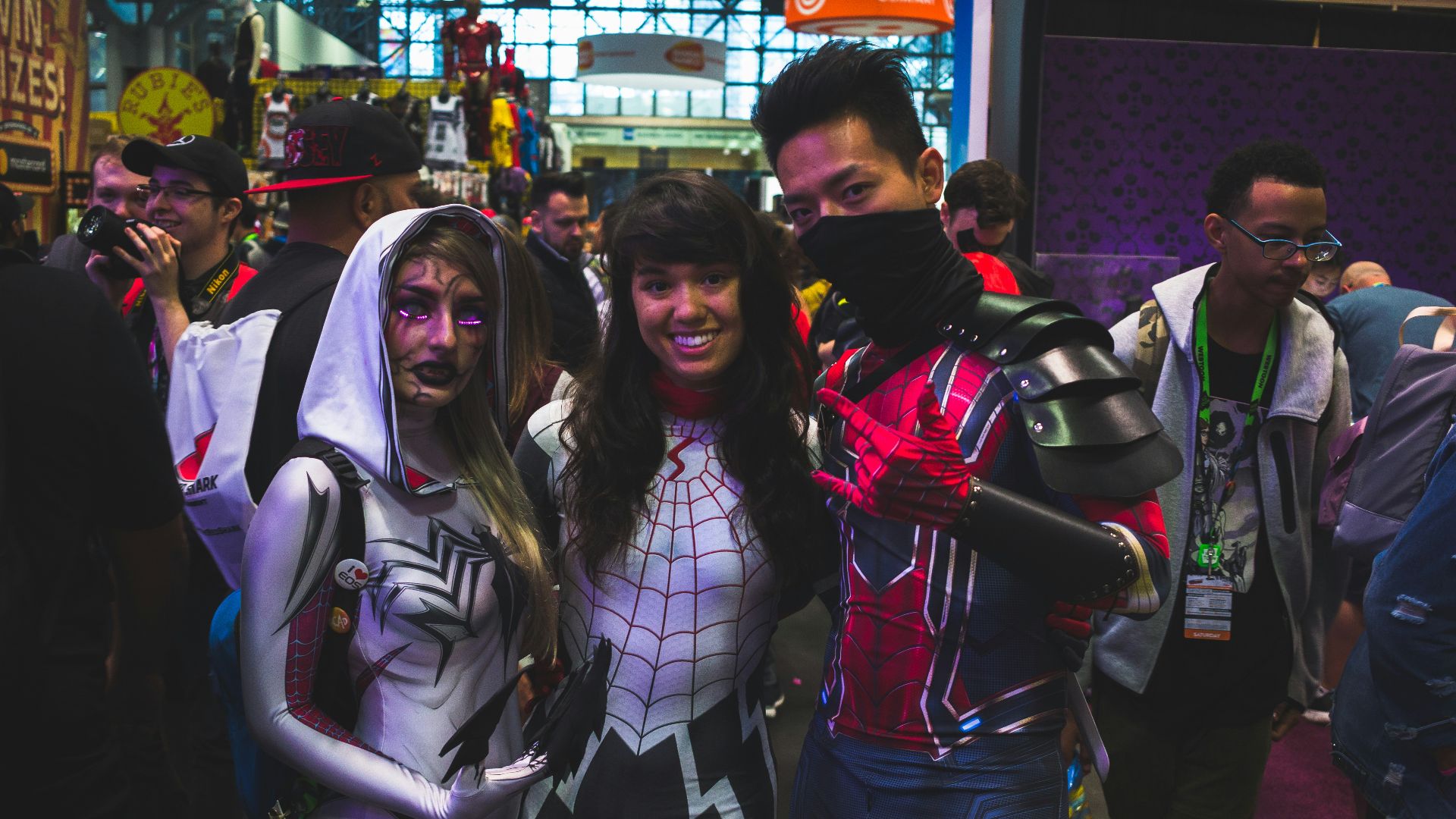 3 women standing beside each other