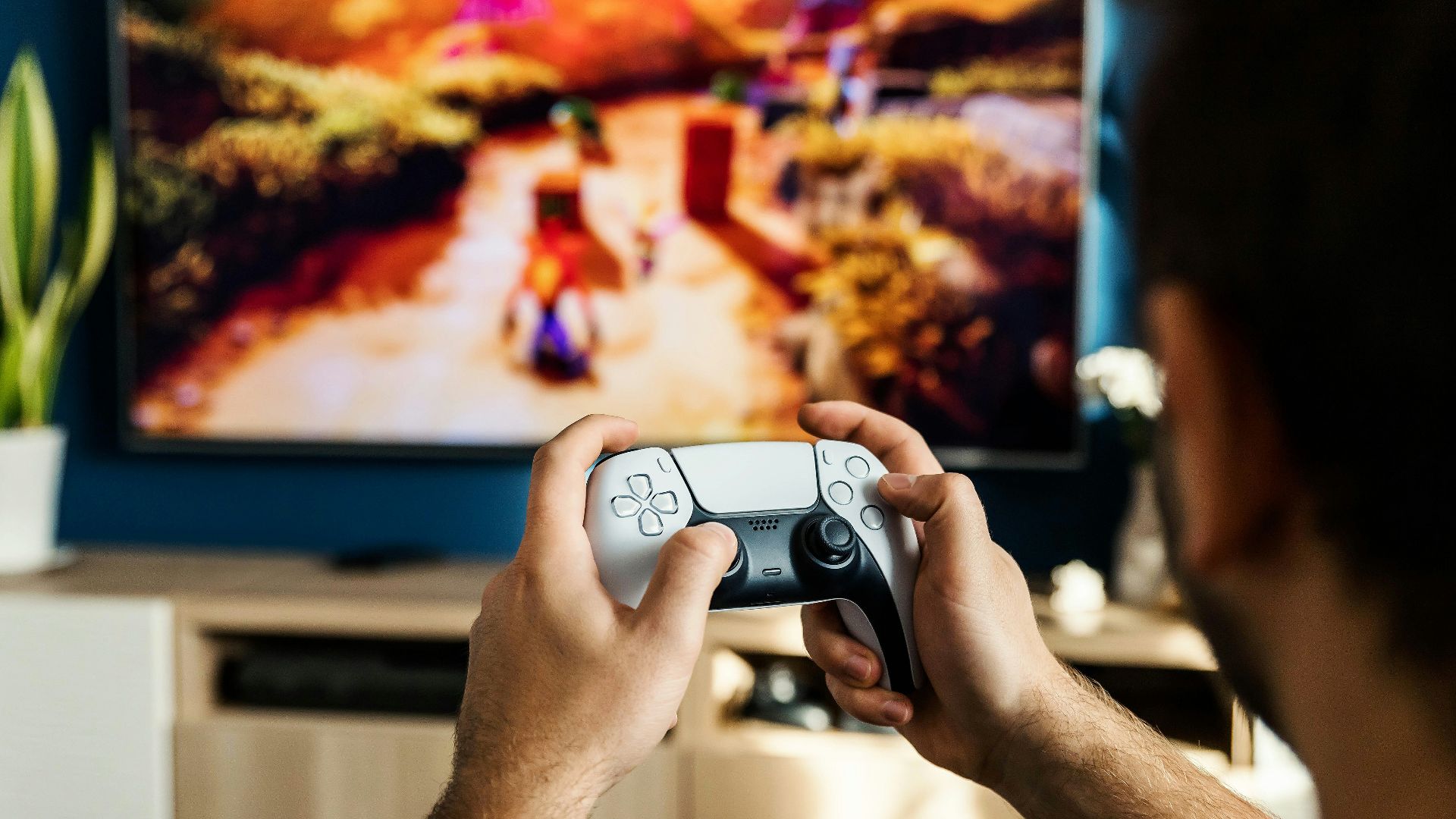 a man playing a video game on the nintendo wii
