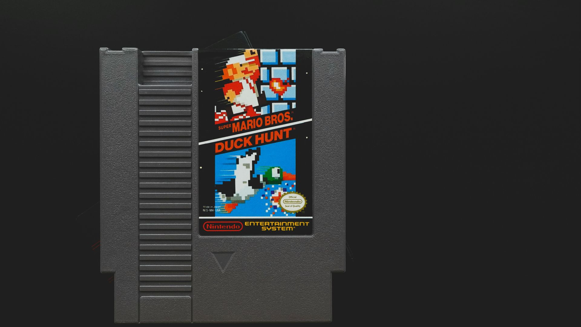 nintendo game boy cartridge on black surface