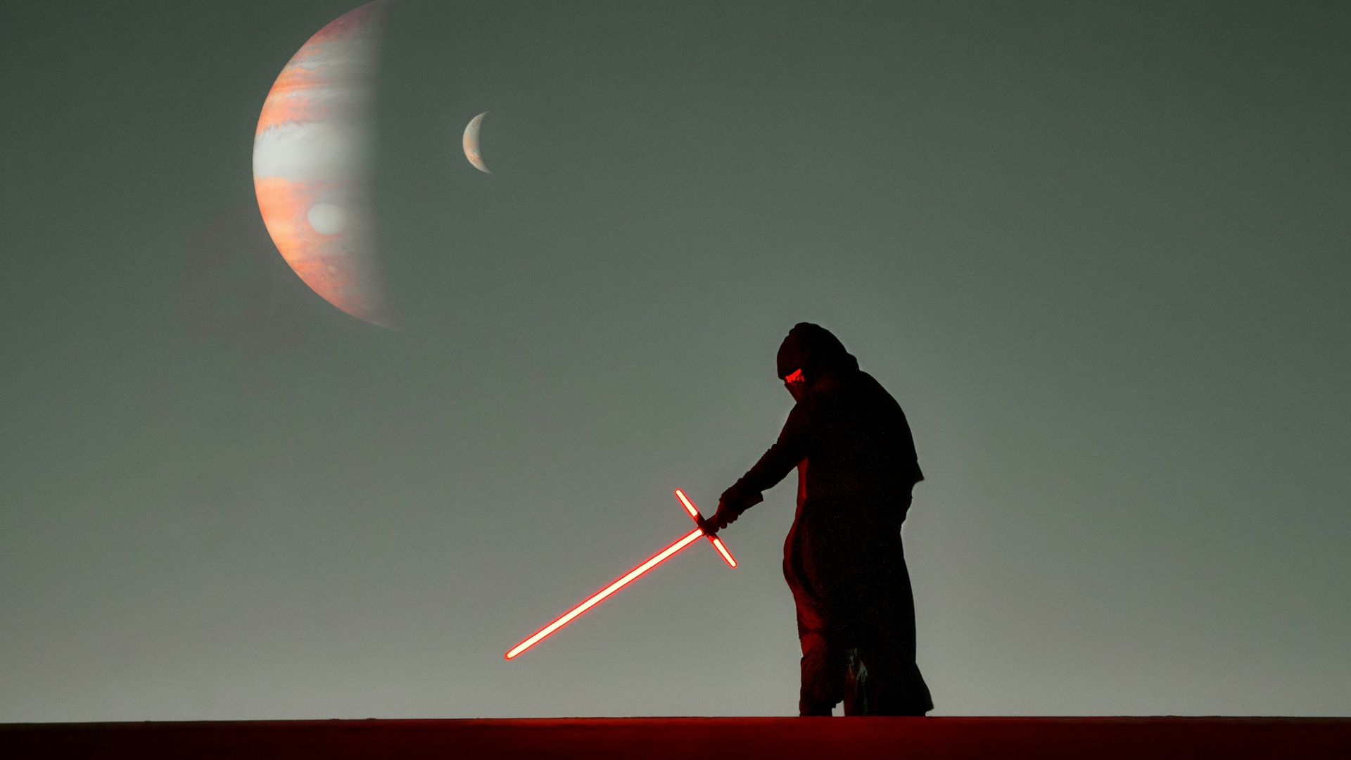 a man that is standing in the dark