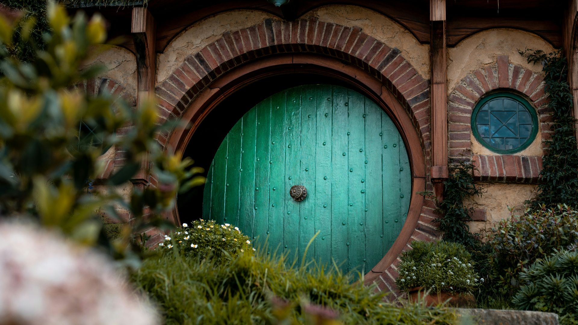 closed green wooden house