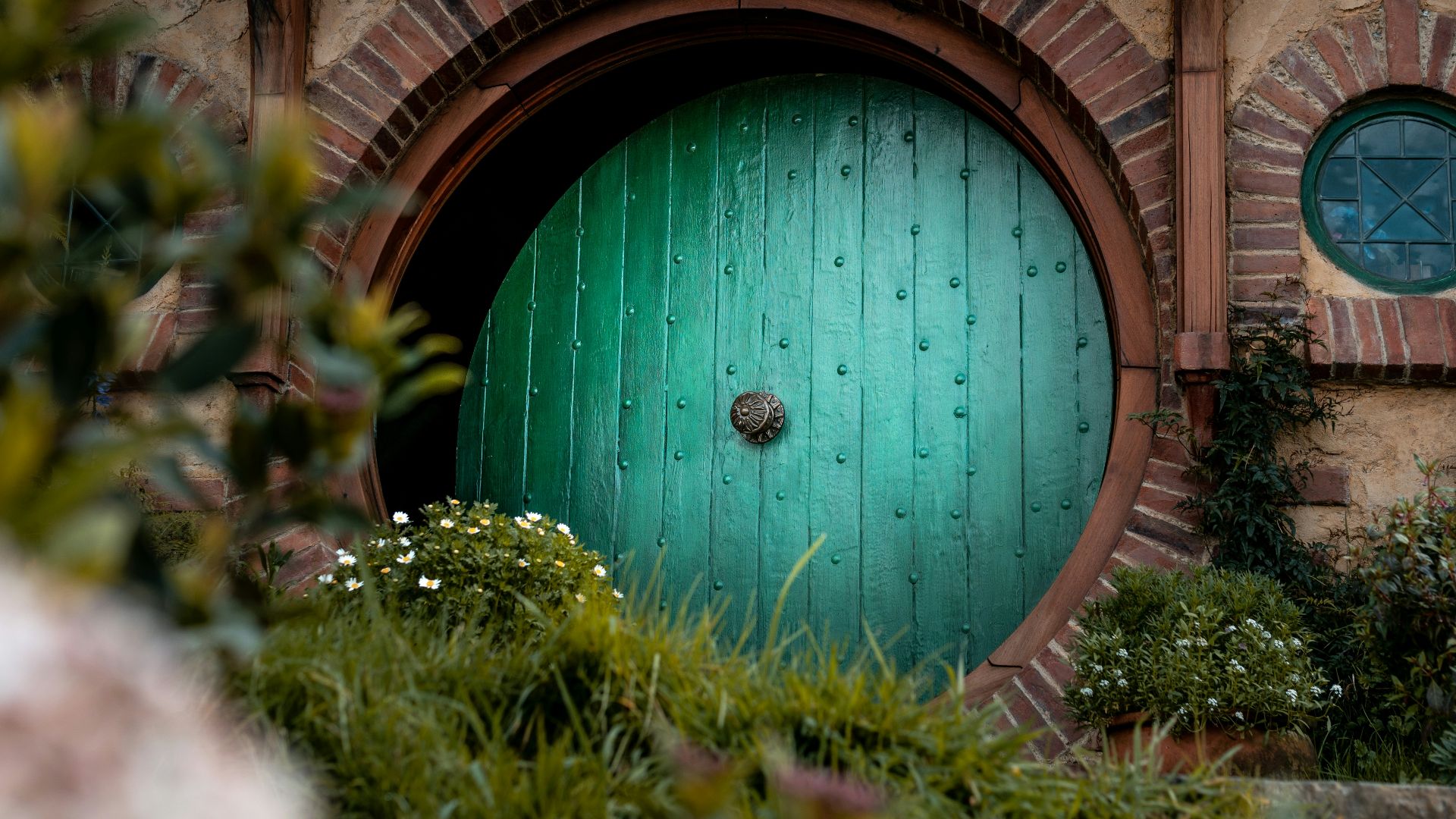 closed green wooden house
