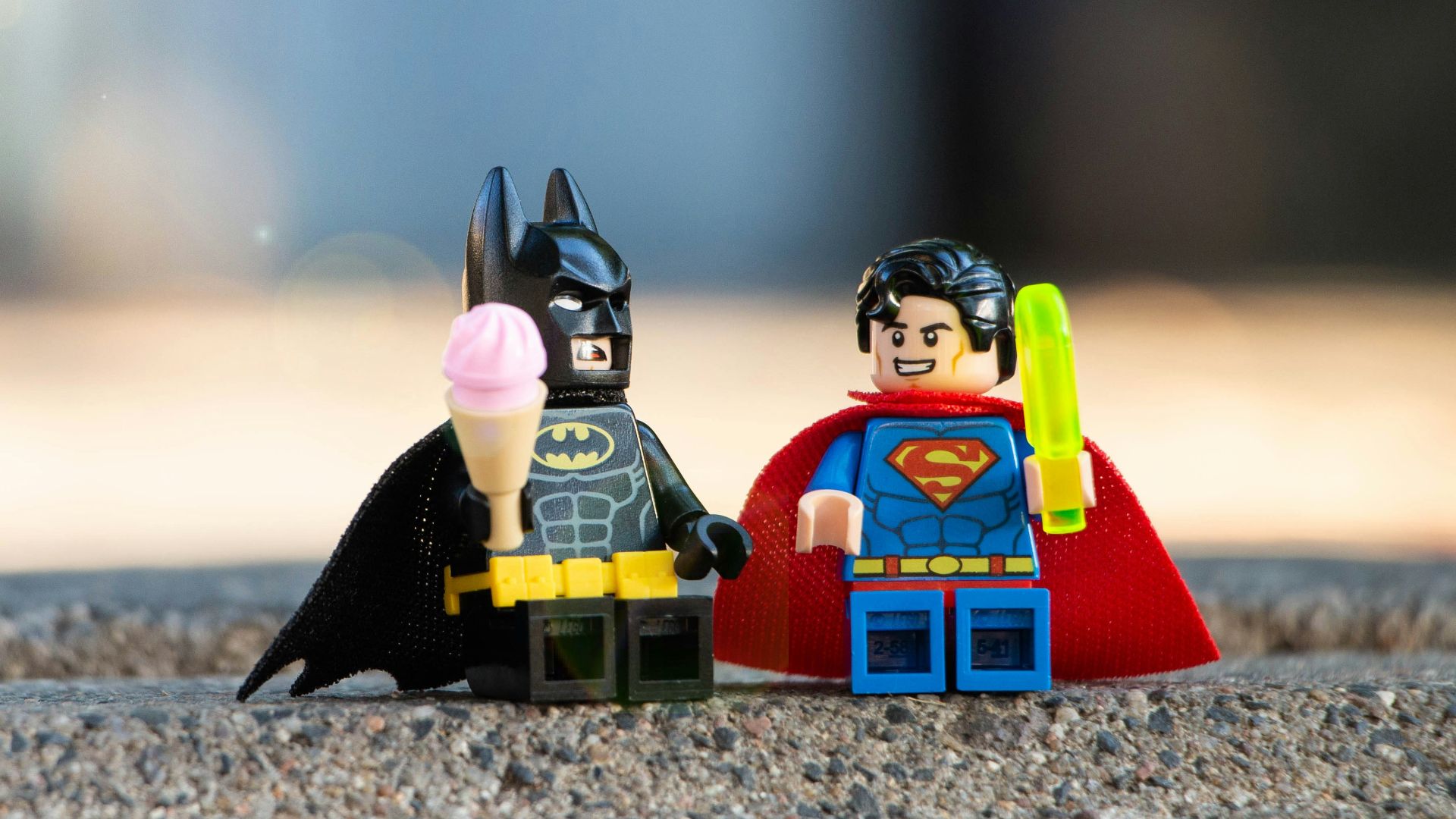 lego mini figure on brown sand