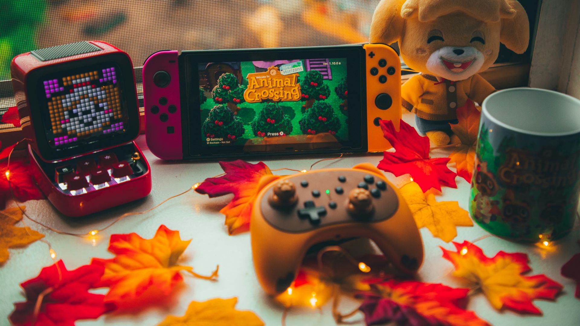 a mobile phone and a box of candy on a table