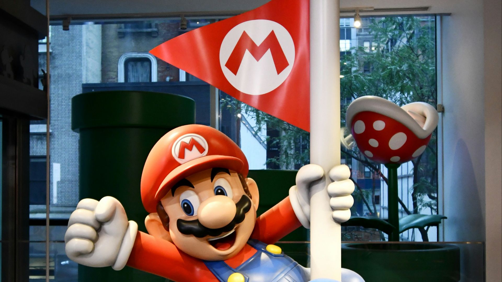 super mario holding m ms candy cane