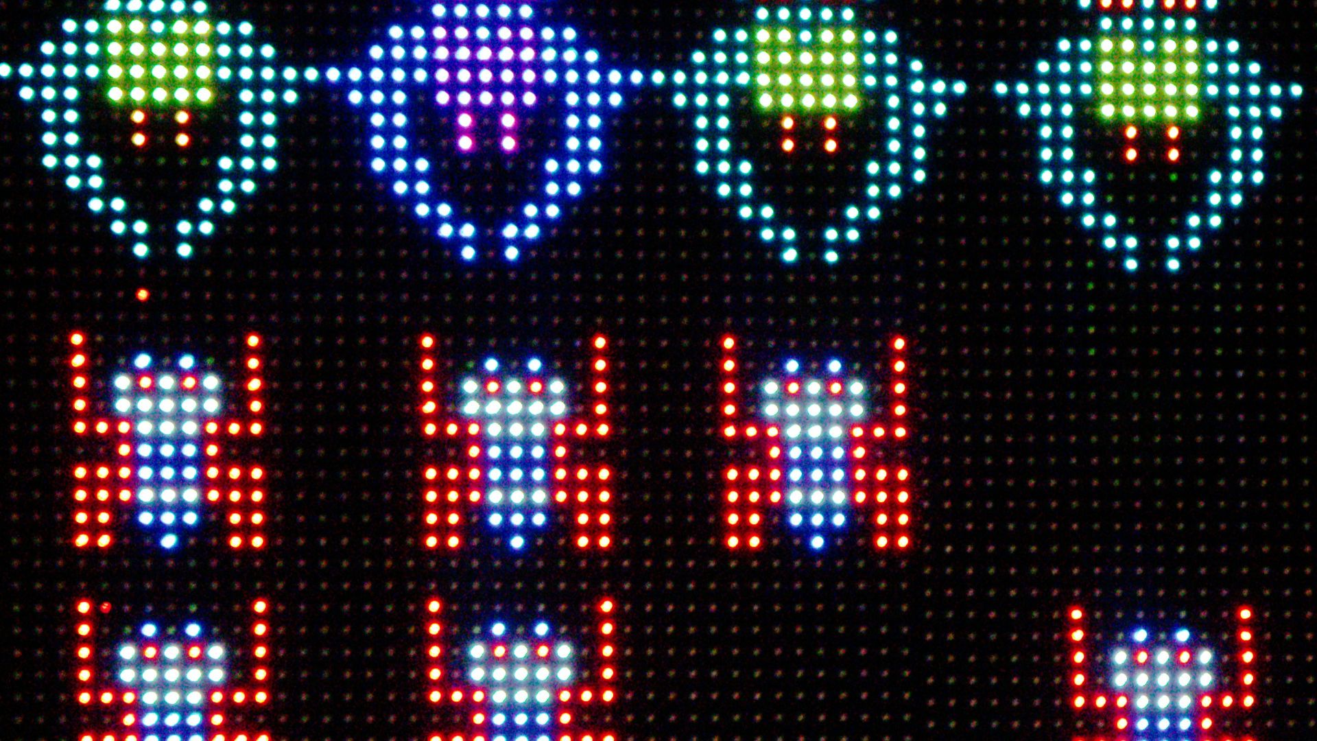 a close up of a lit up sign on a building