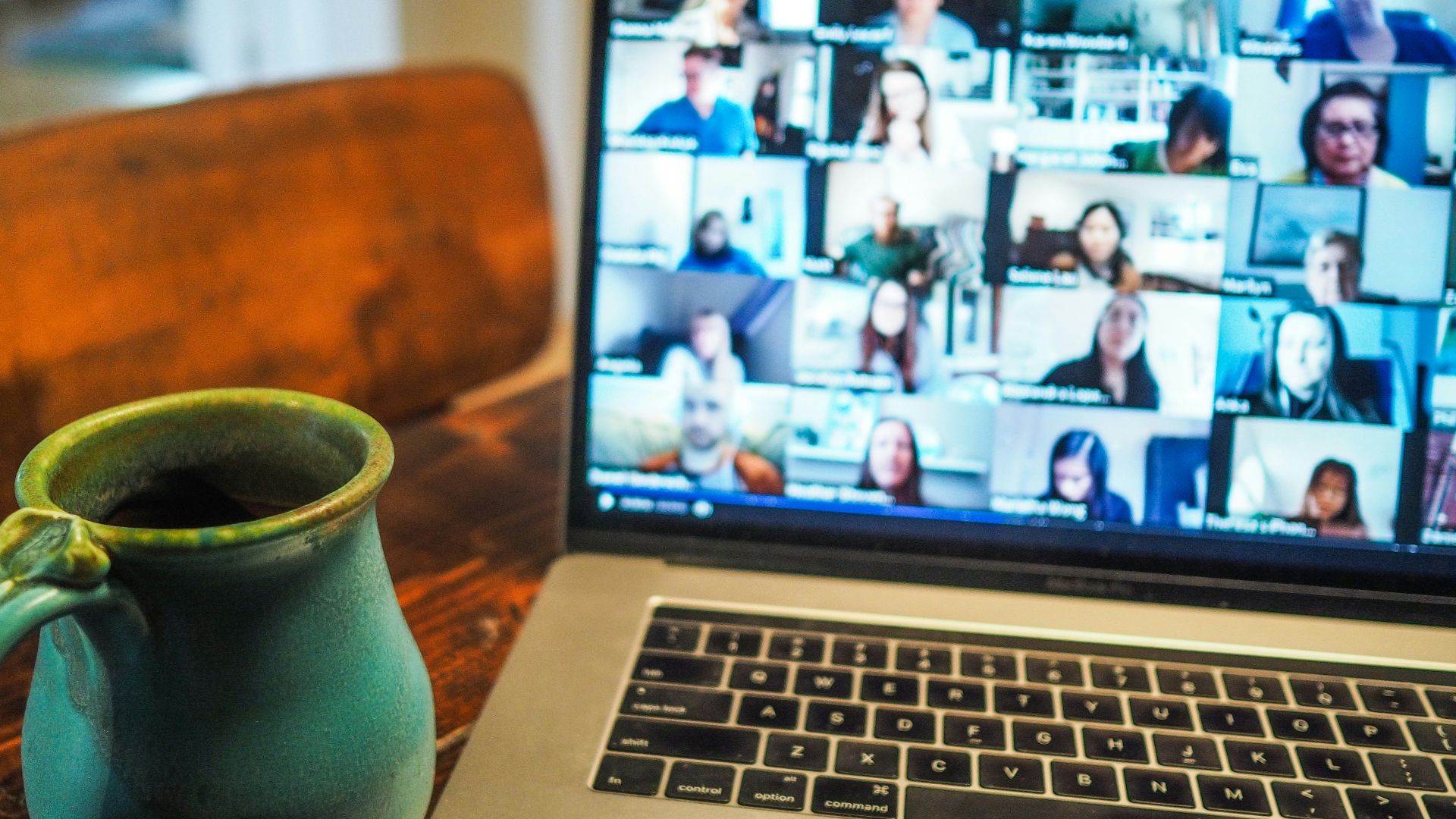 macbook pro displaying group of people