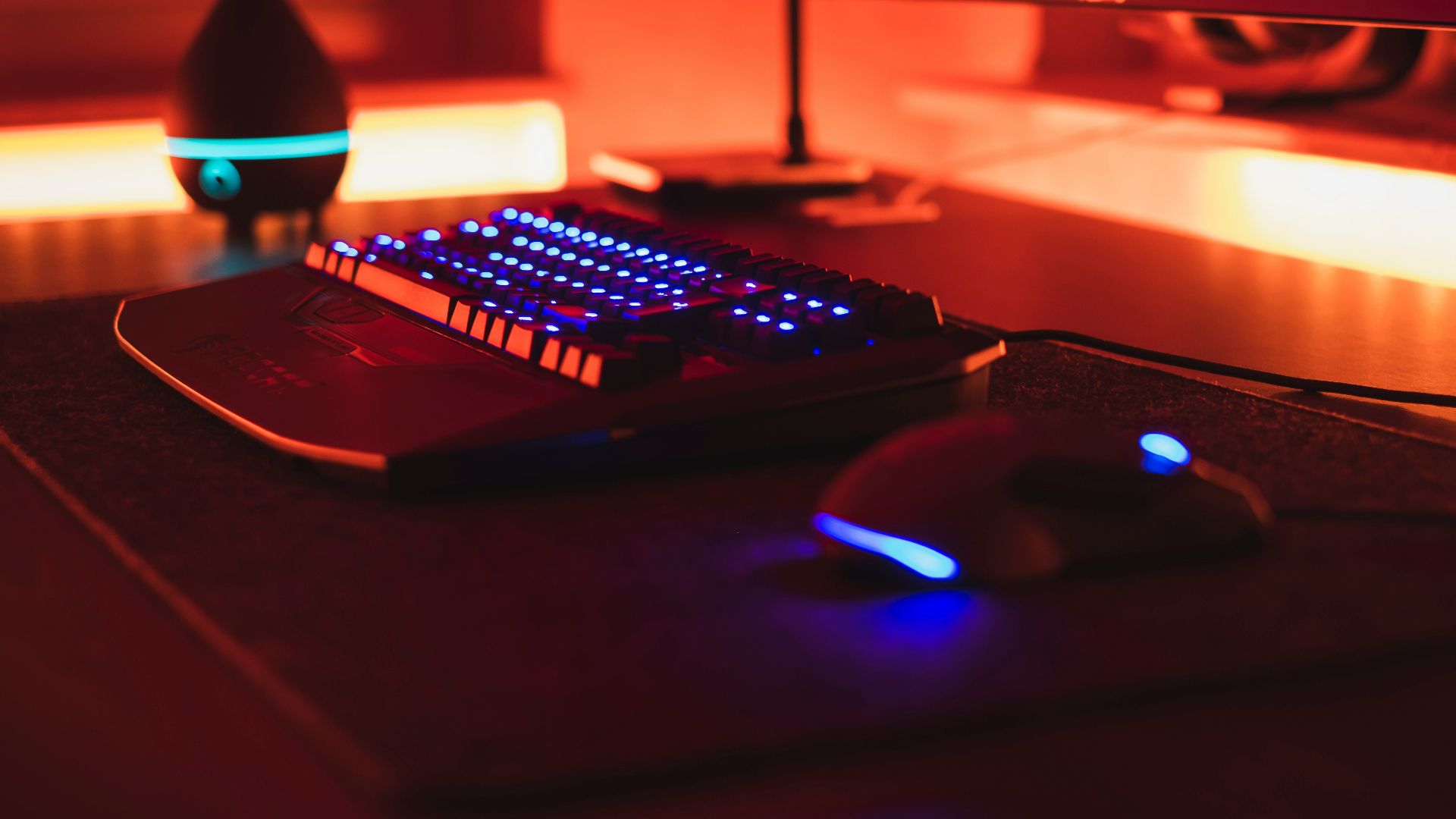 black computer keyboard beside black flat screen computer monitor