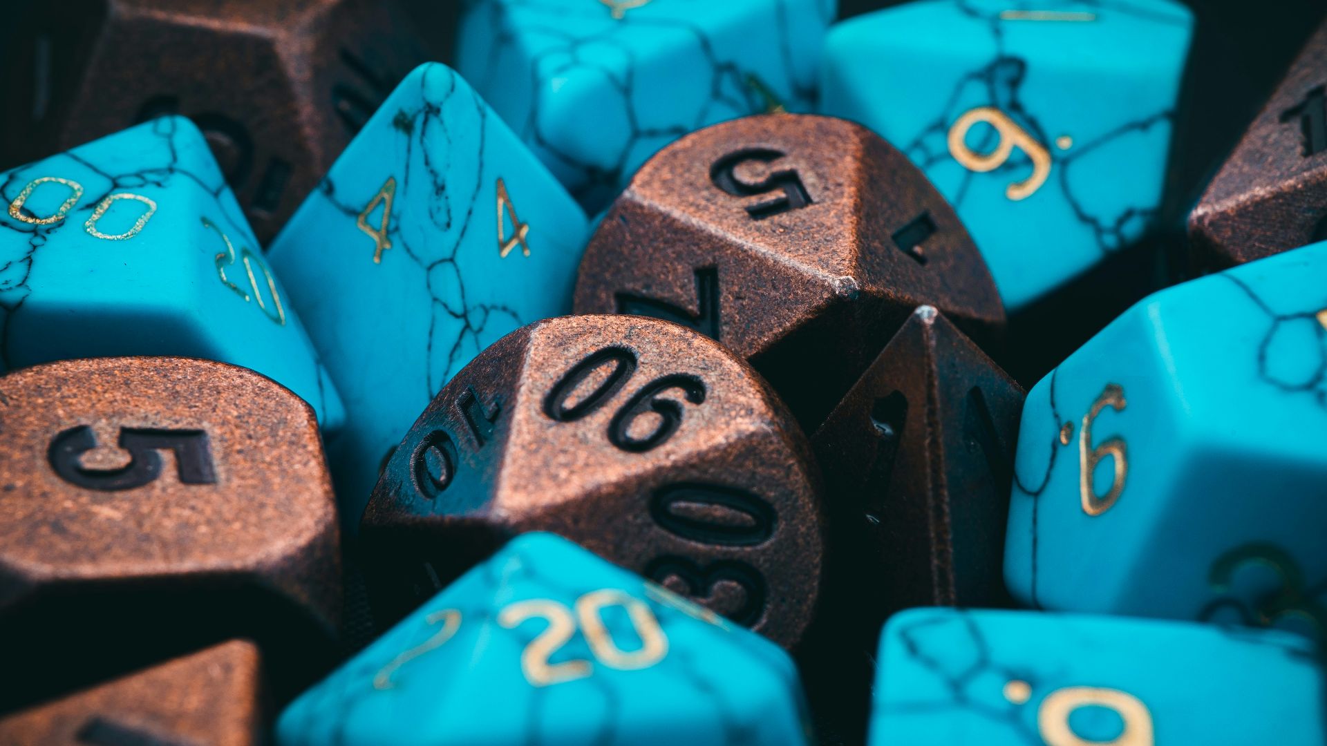 a bunch of blue and brown dice with numbers on them
