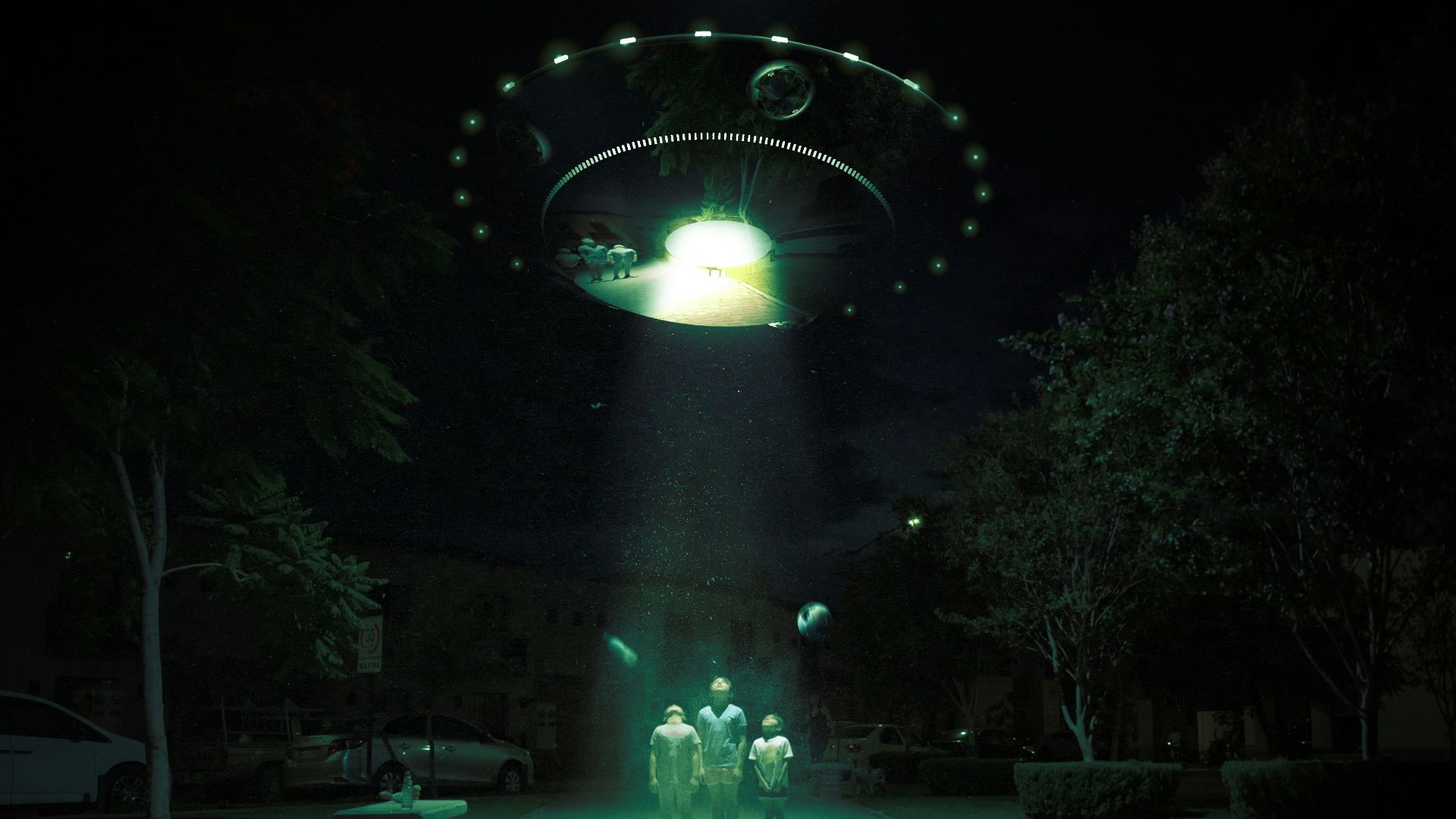 a group of people standing in front of a lighted archway