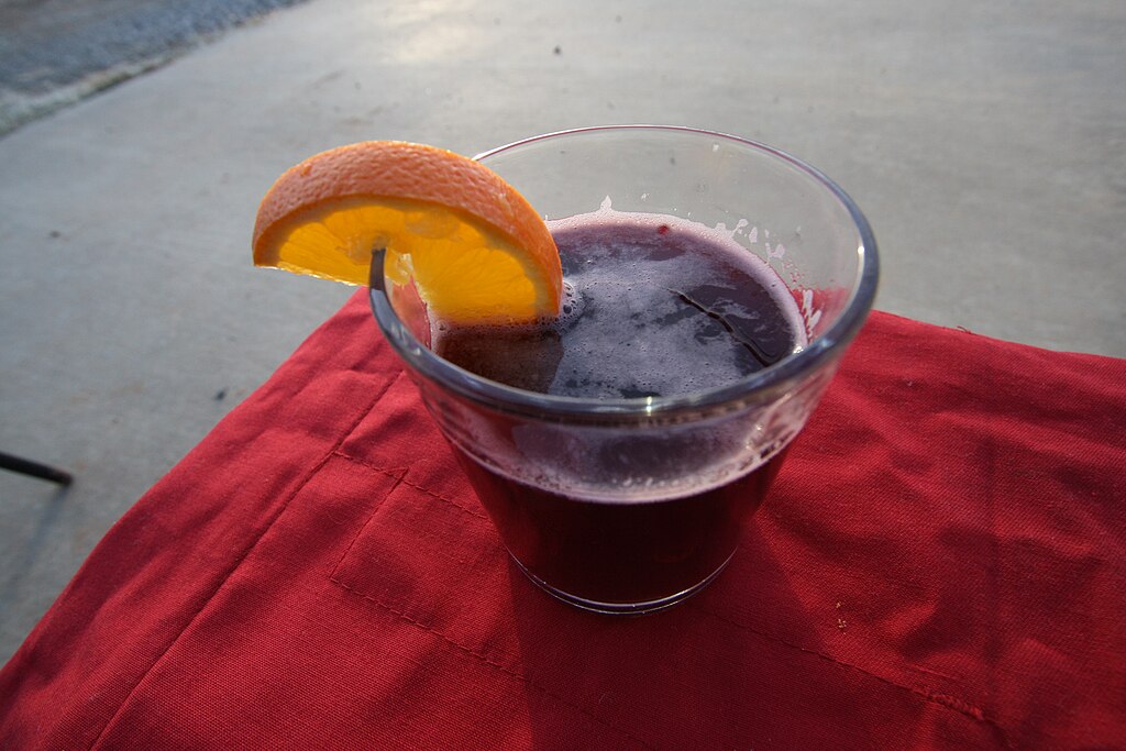 Glühwein (Hot Mulled Wine) In A Glass With An Orange Slice 13