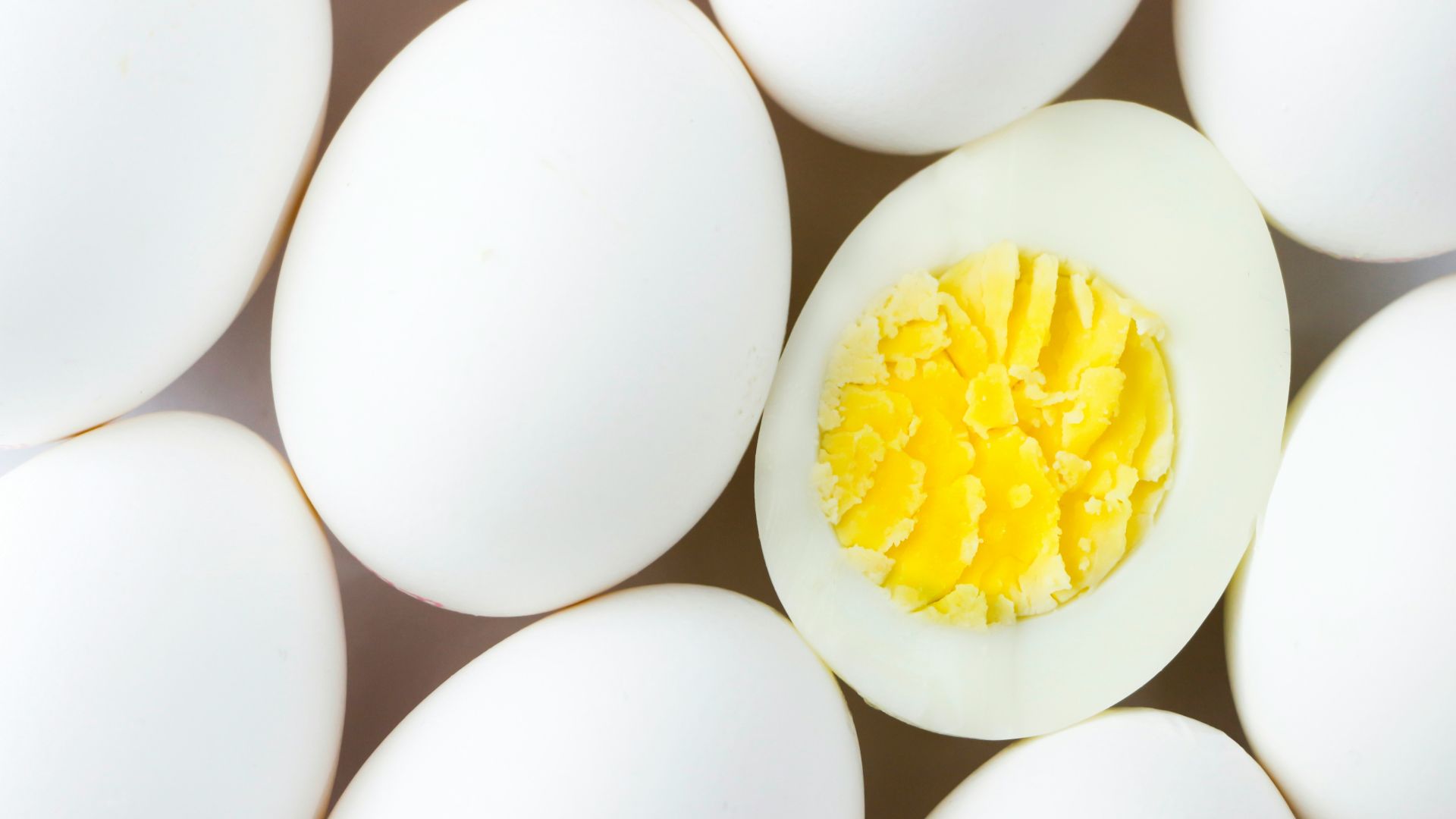 white egg lot on brown wooden table