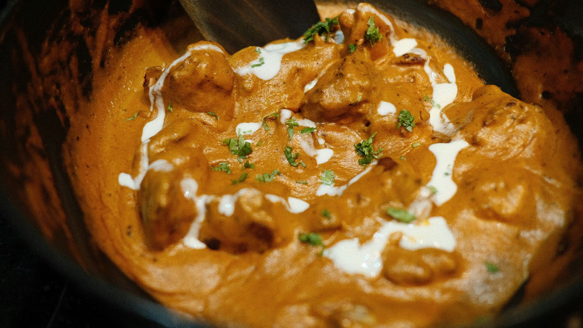 brown and green dish on brown wooden bowl