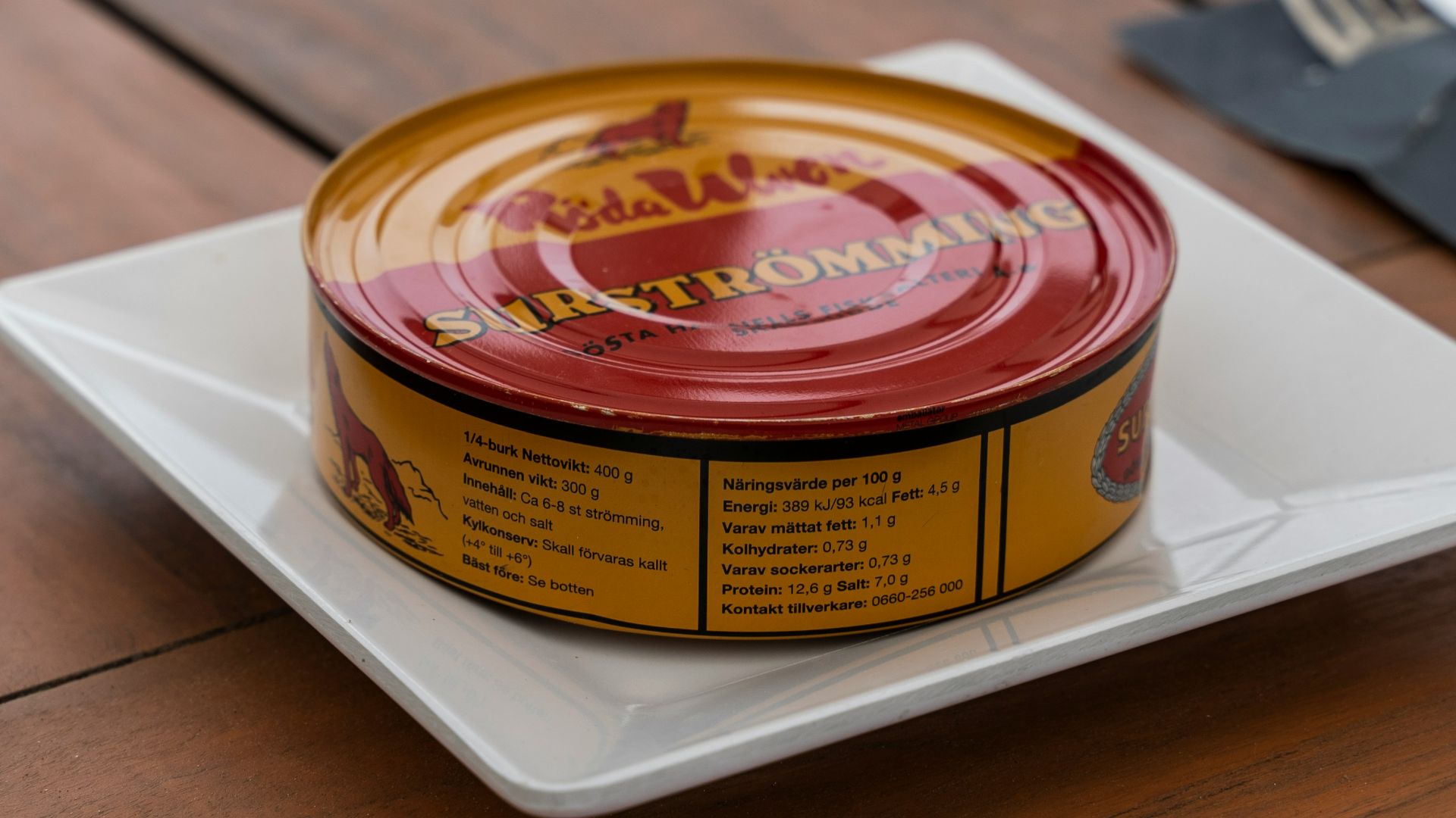 yellow and red labeled can