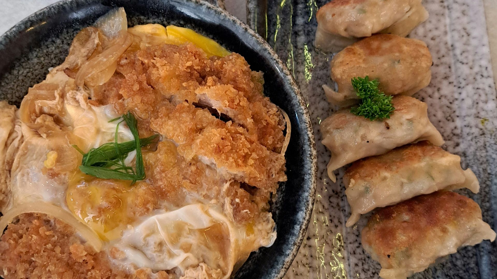 A bowl of food sitting on top of a table