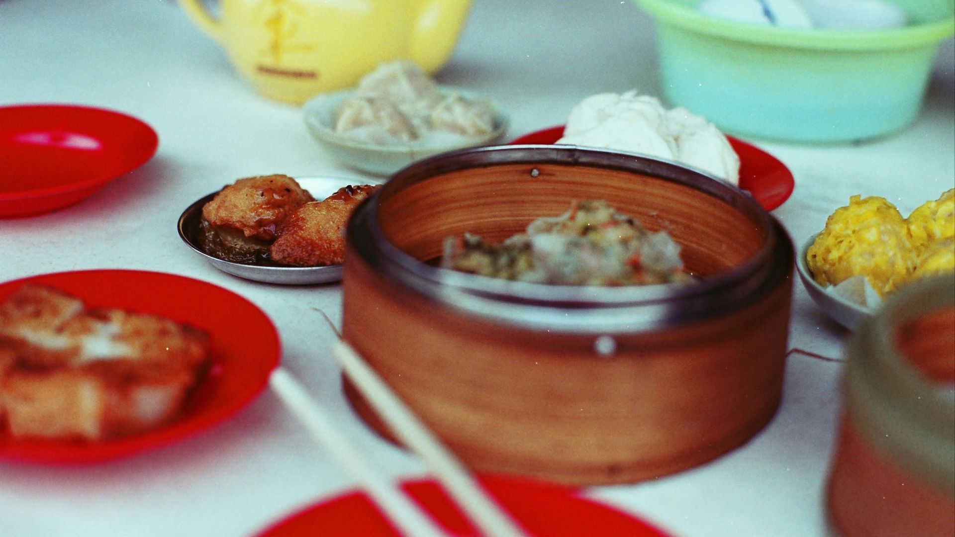 cooked foods on brown bowls and saucers