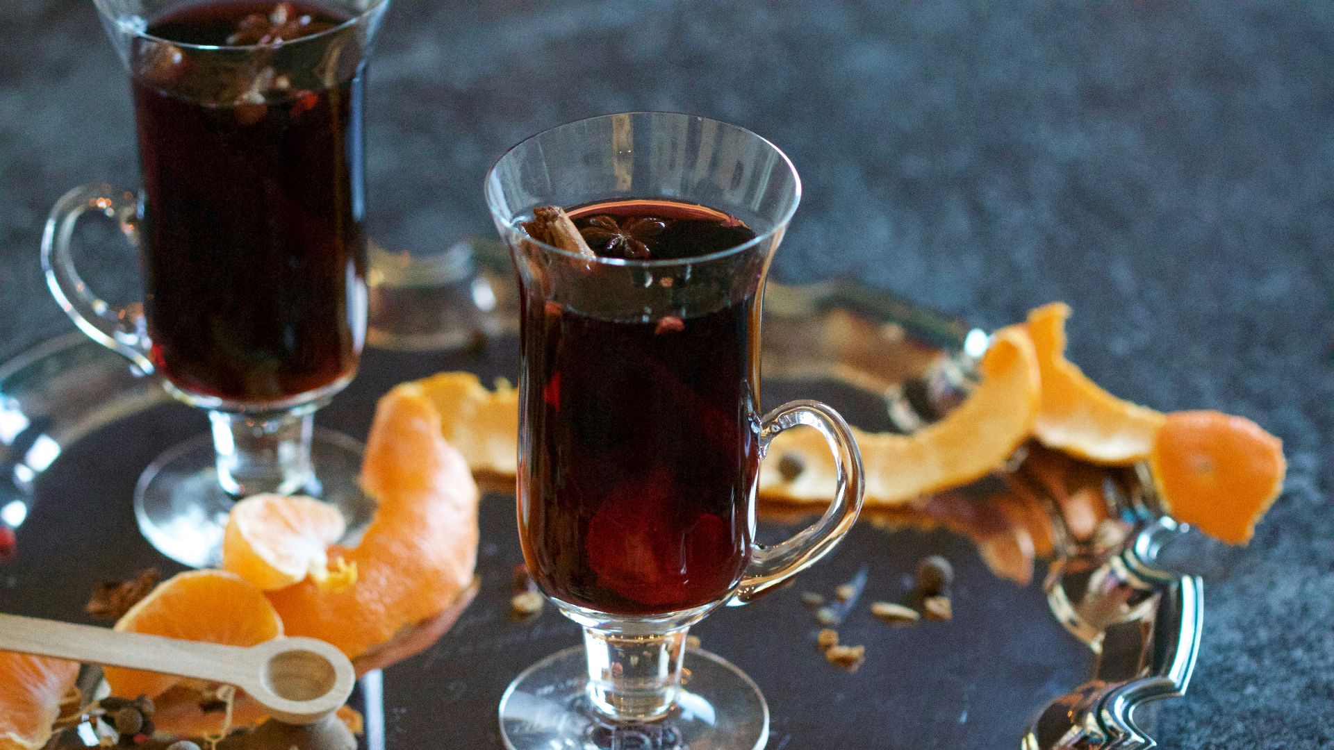 shallow focus photo of brown liquid in clear glass cup
