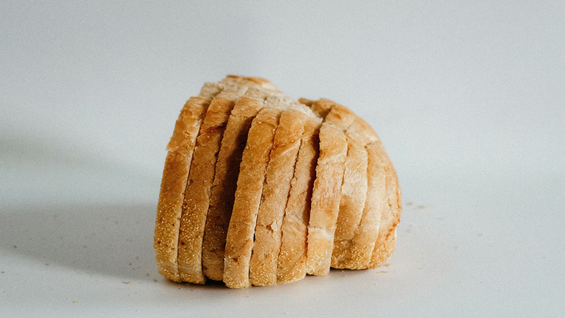 sliced of bread on top of white surface