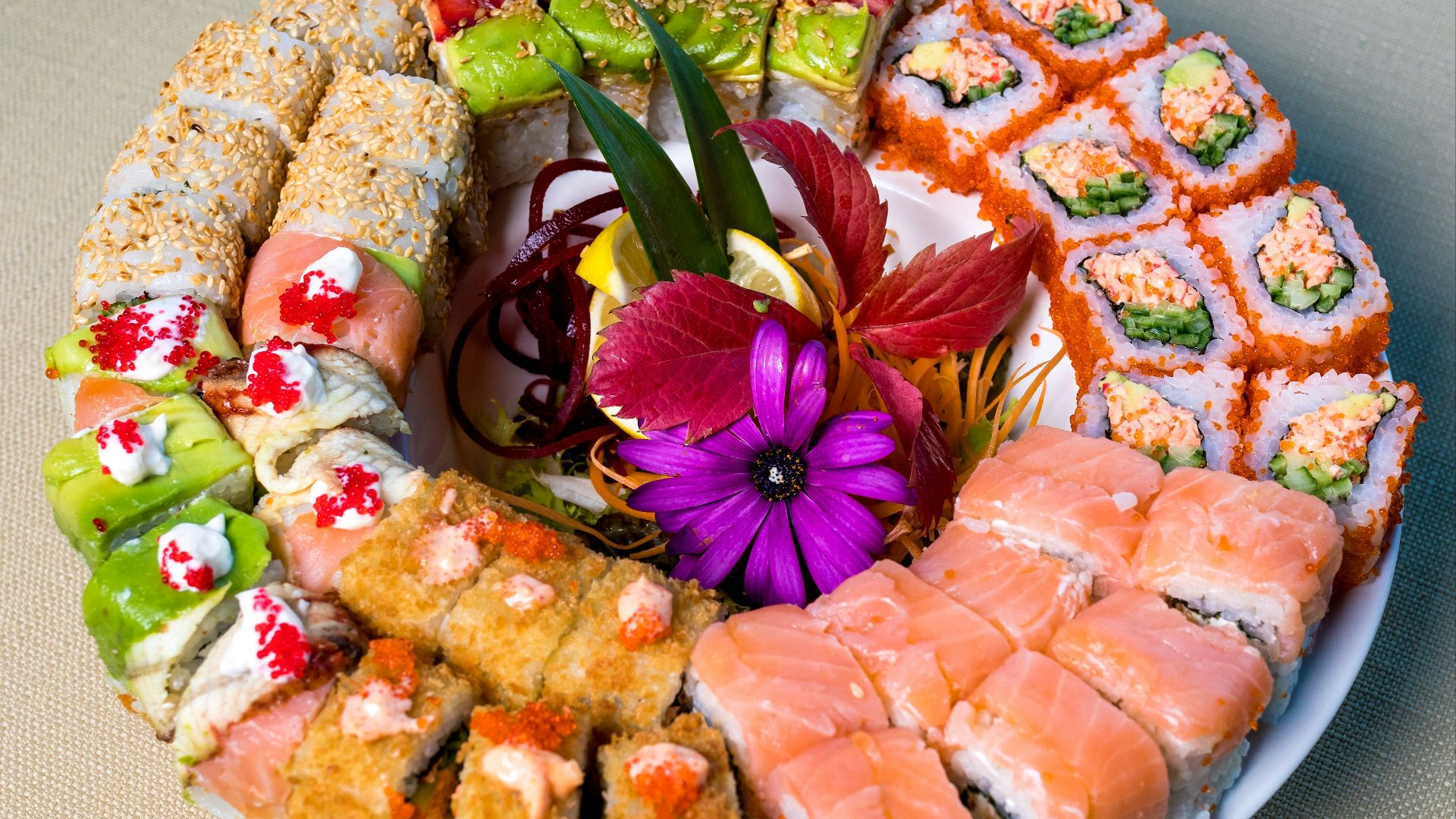 brown and white cake with flower on top