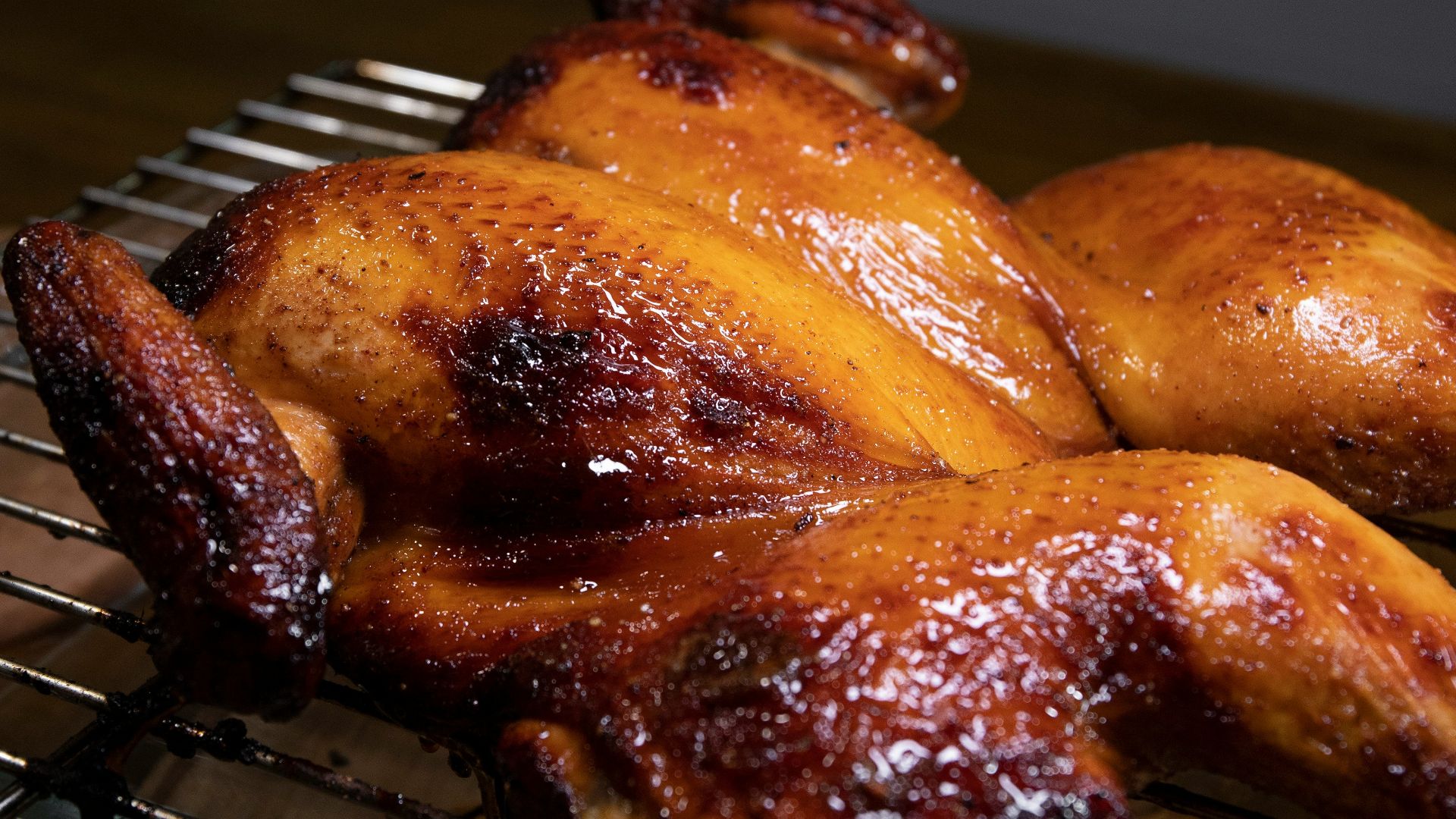 roasted chicken on black metal grill