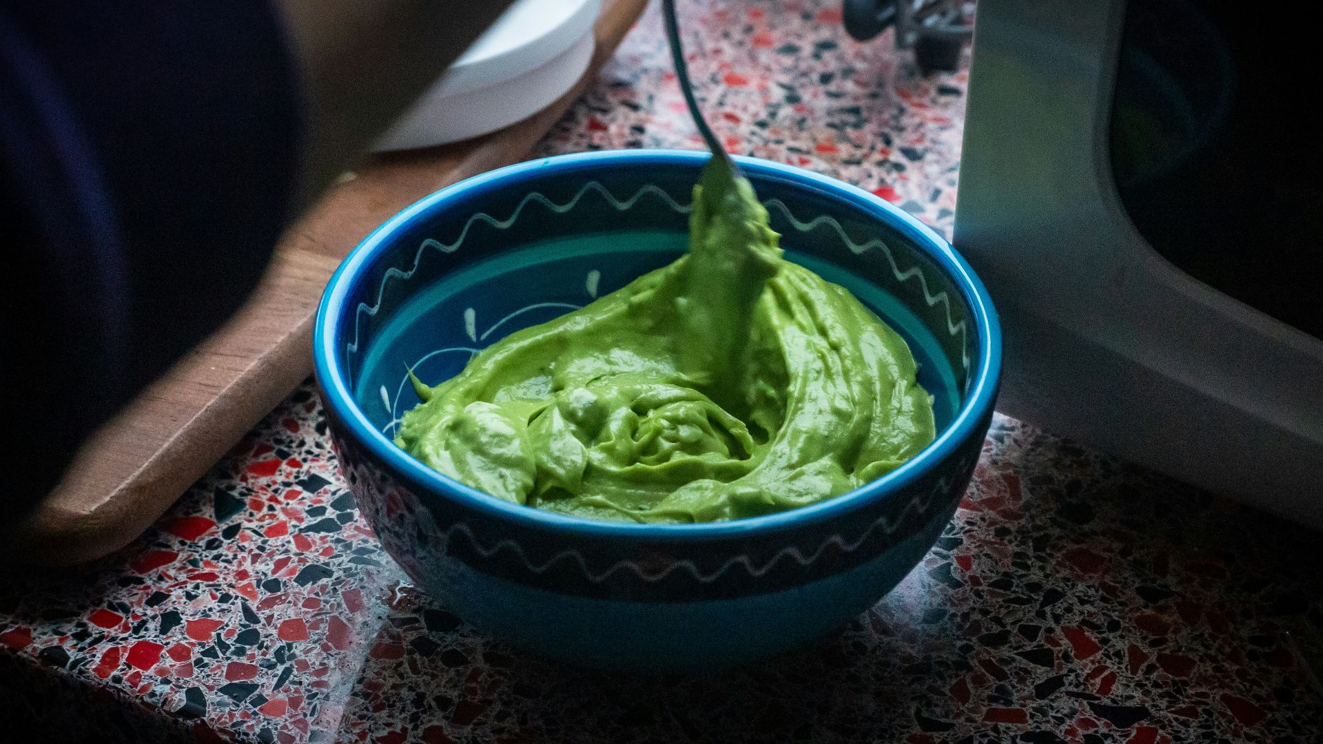 green plastic bowl on table