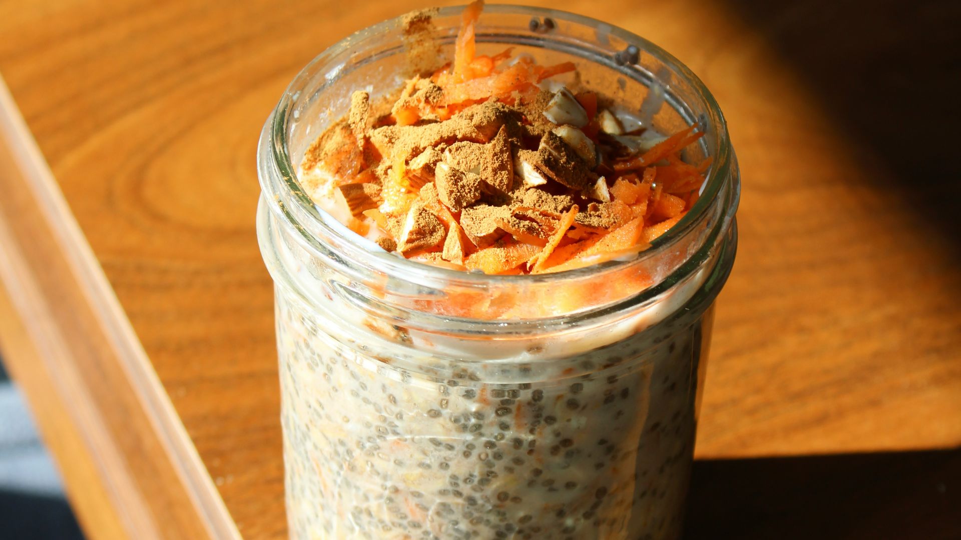 a jar of food sitting on top of a wooden table
