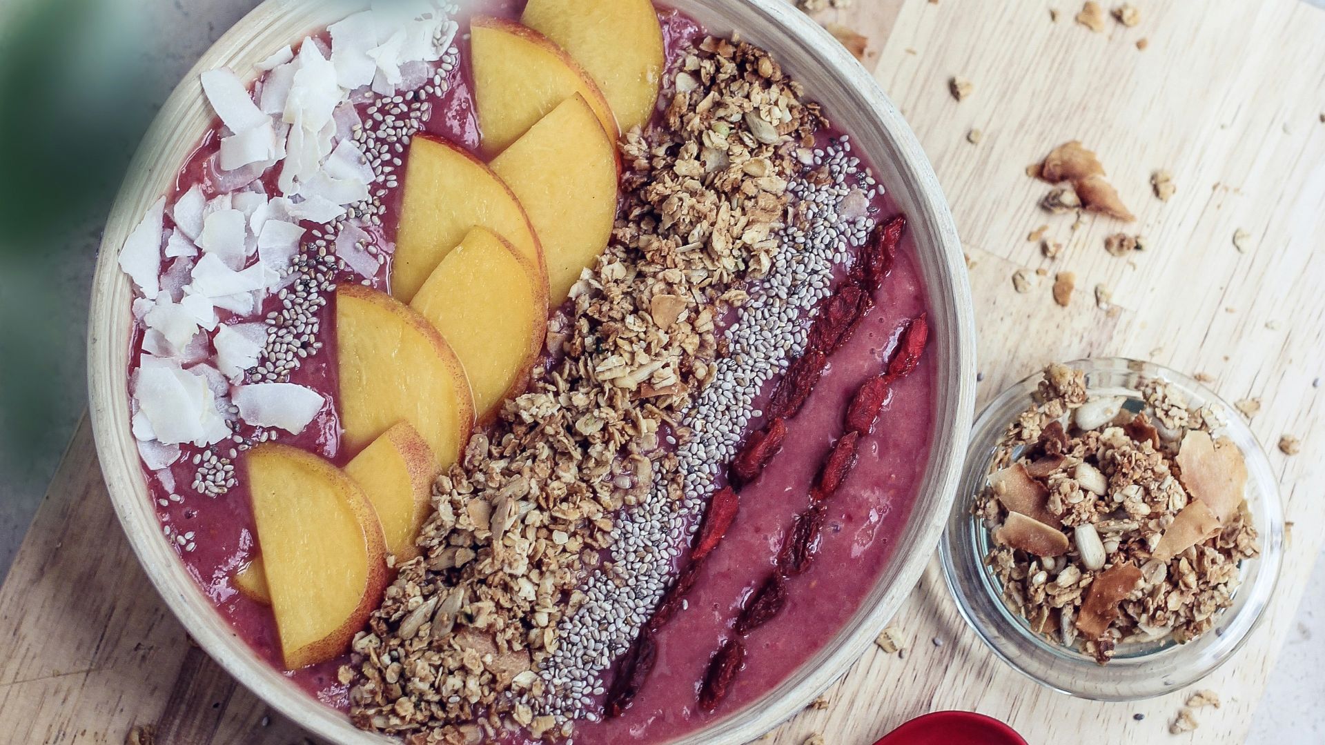 sliced fruits in white ceramic bowl