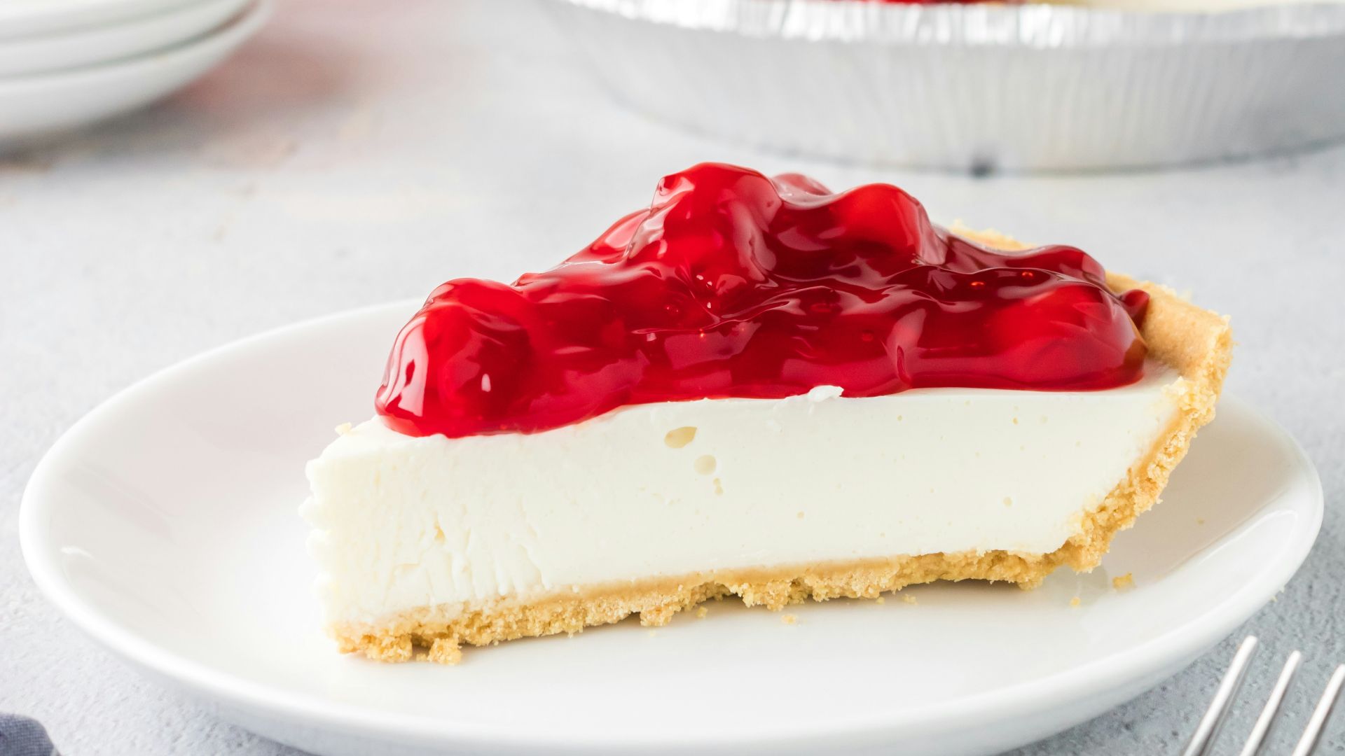 red and white cake on white ceramic plate