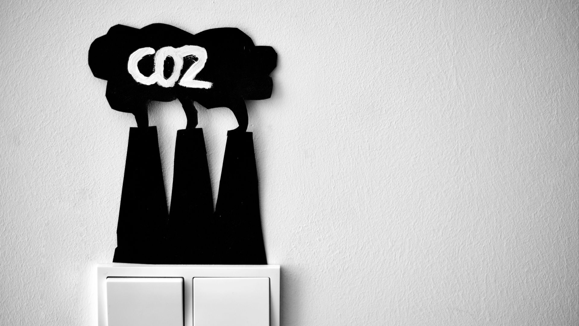 a black and white photo of a light switch