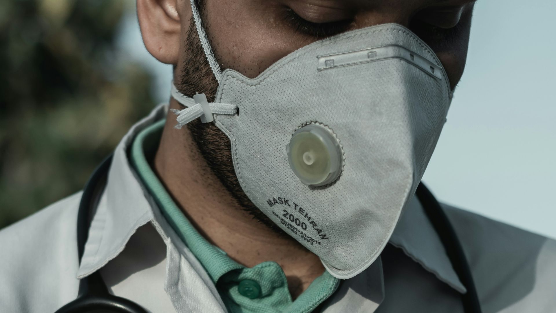 person in white and black stethoscope